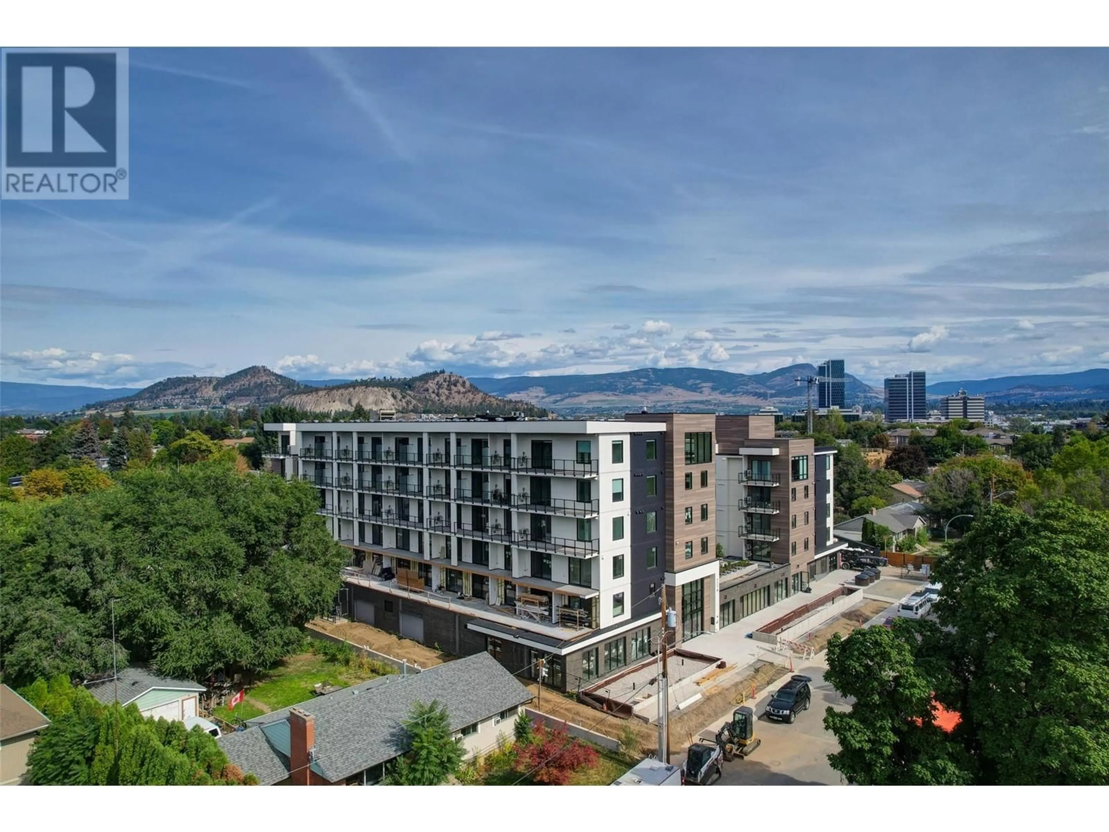 A pic from outside/outdoor area/front of a property/back of a property/a pic from drone, mountain view for 507 - 1274 DEVONSHIRE AVENUE, Kelowna British Columbia V1Y6B7