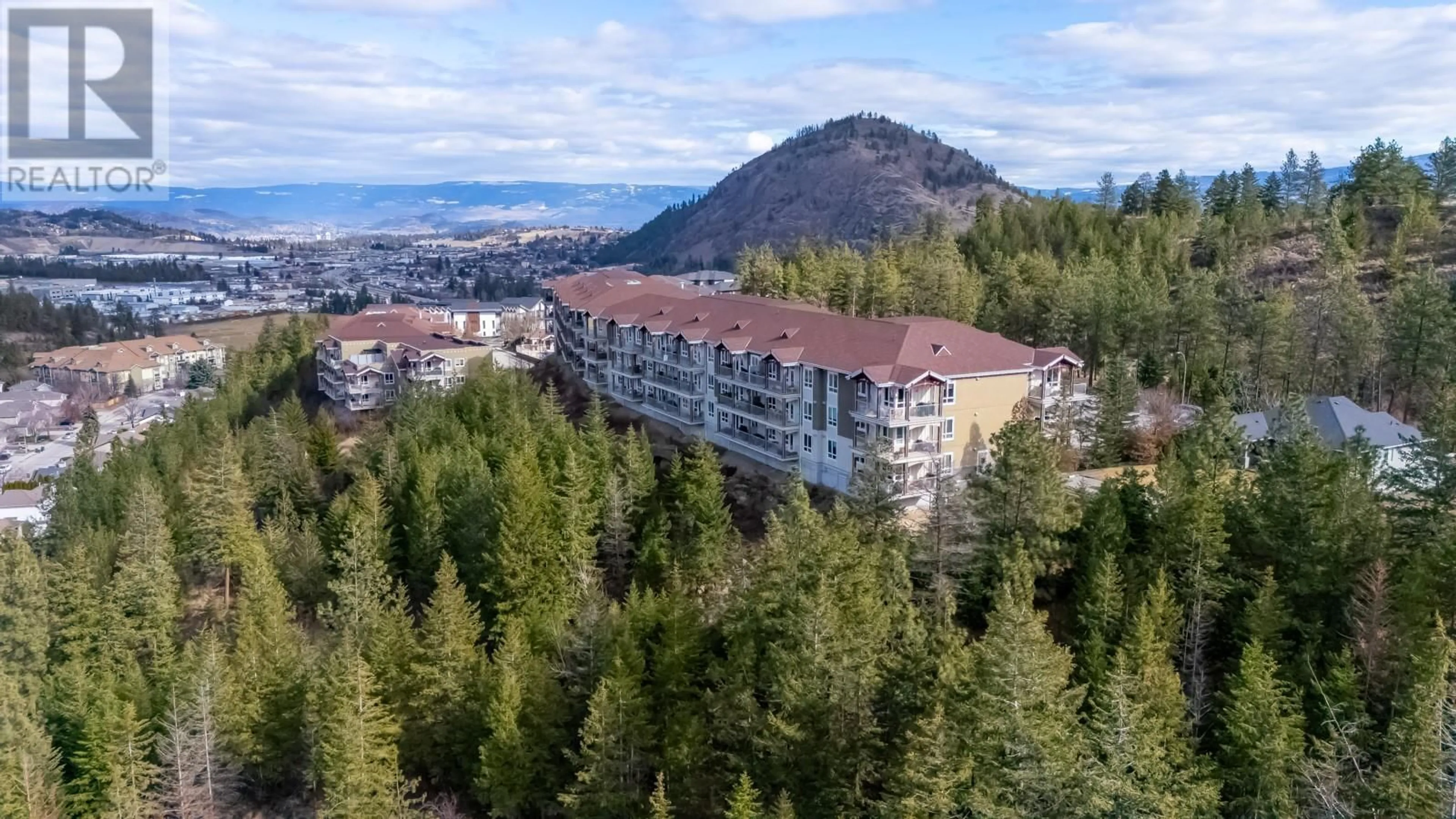 A pic from outside/outdoor area/front of a property/back of a property/a pic from drone, mountain view for 2210 Upper Sundance Drive Unit# 1314, West Kelowna British Columbia V4T3E9