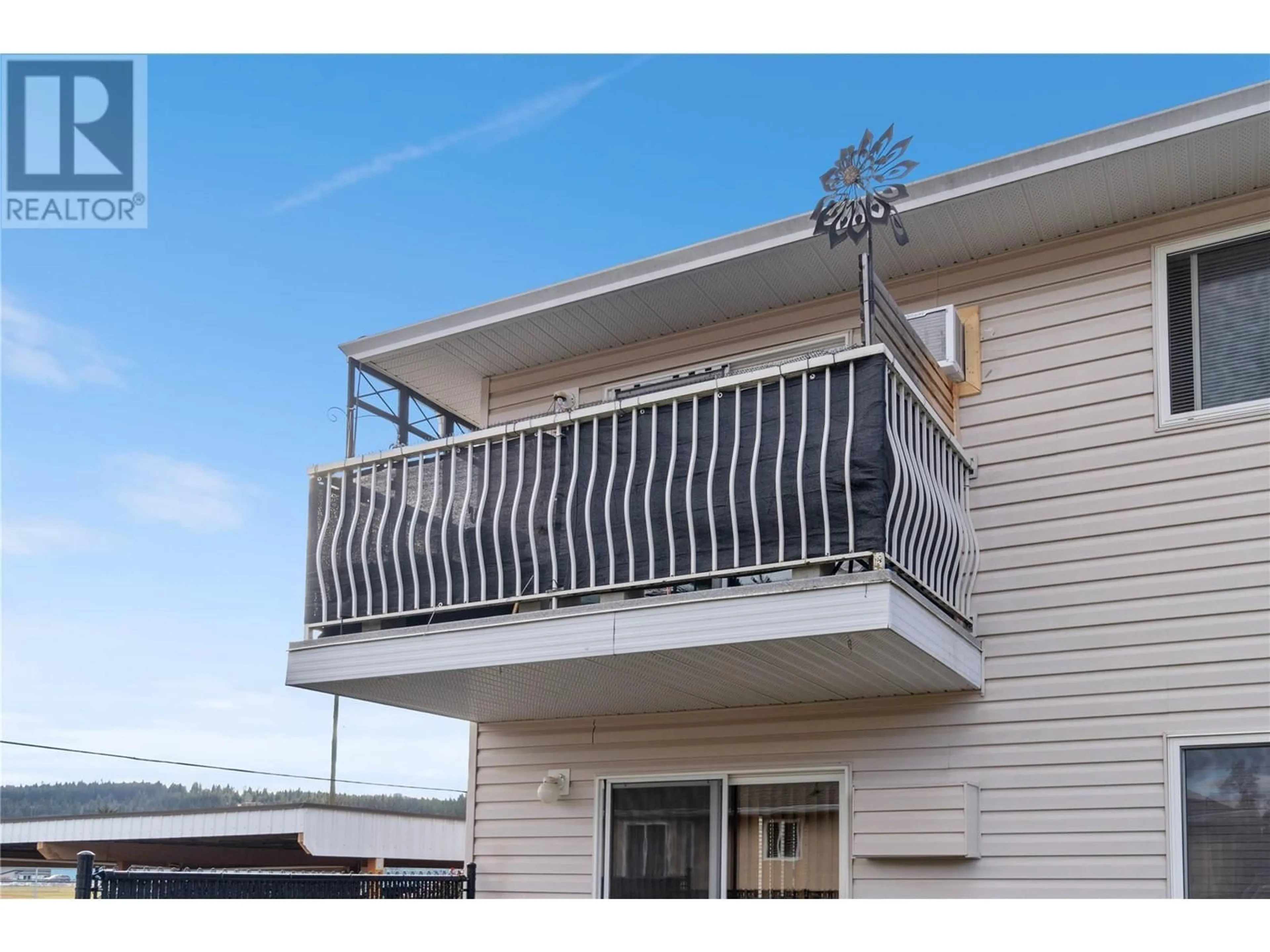 Home with vinyl exterior material, building for 210 - 211 KILDONAN AVENUE, Enderby British Columbia V0E1V2