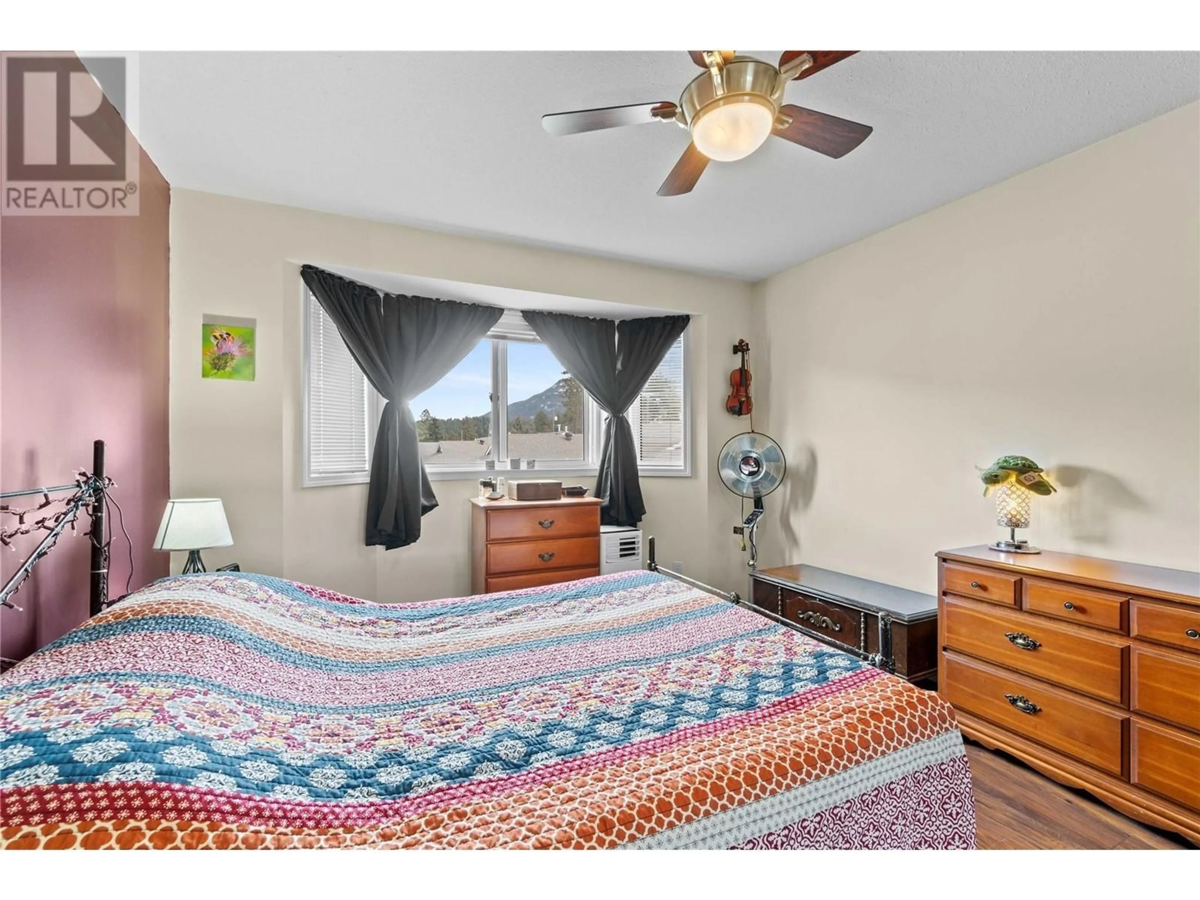 Bedroom with bed, unknown for 210 - 211 KILDONAN AVENUE, Enderby British Columbia V0E1V2
