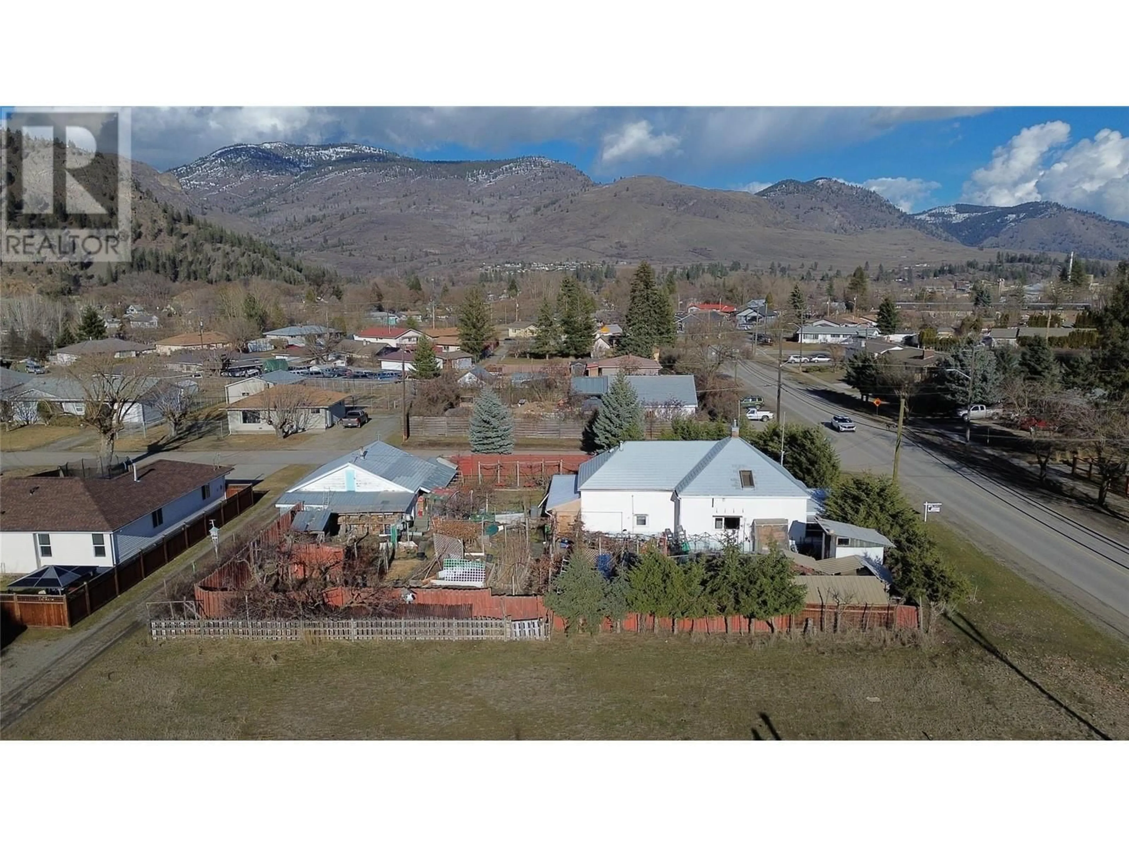 A pic from outside/outdoor area/front of a property/back of a property/a pic from drone, mountain view for 1625 68TH Avenue, Grand Forks British Columbia V0H1H0