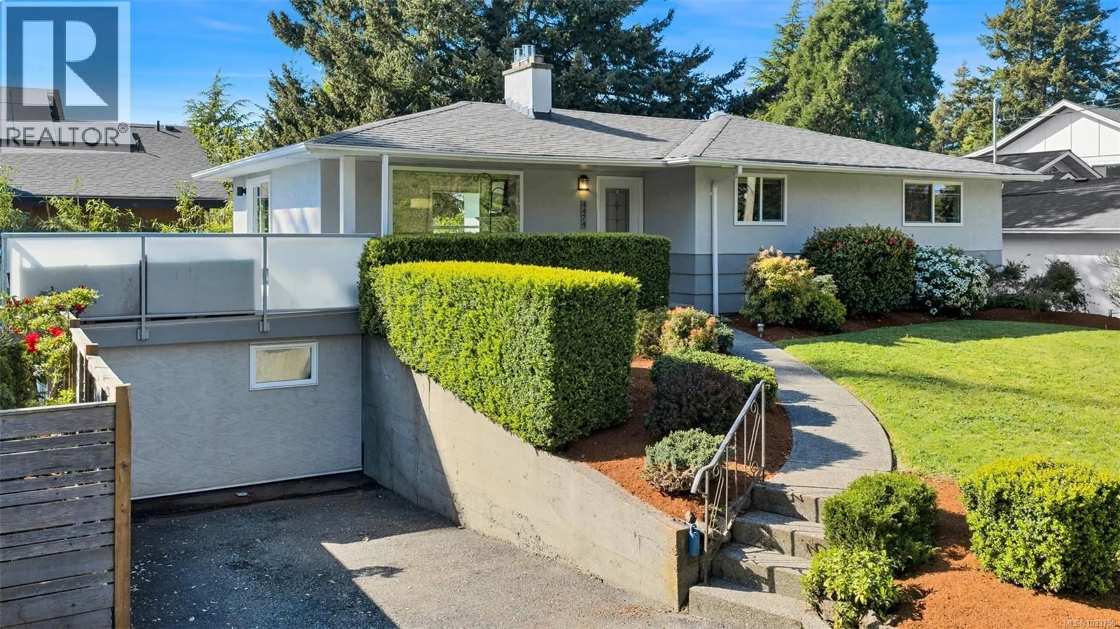 Home with vinyl exterior material, street for 4474 TORQUAY DRIVE, Saanich British Columbia V8N3L5