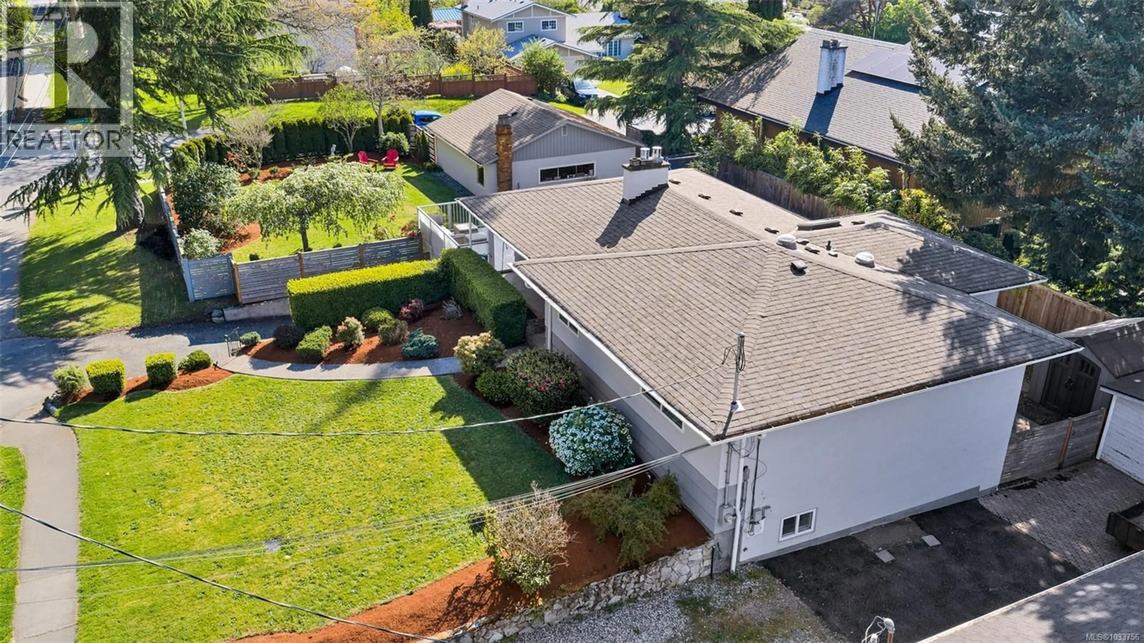 A pic from outside/outdoor area/front of a property/back of a property/a pic from drone, street for 4474 TORQUAY DRIVE, Saanich British Columbia V8N3L5