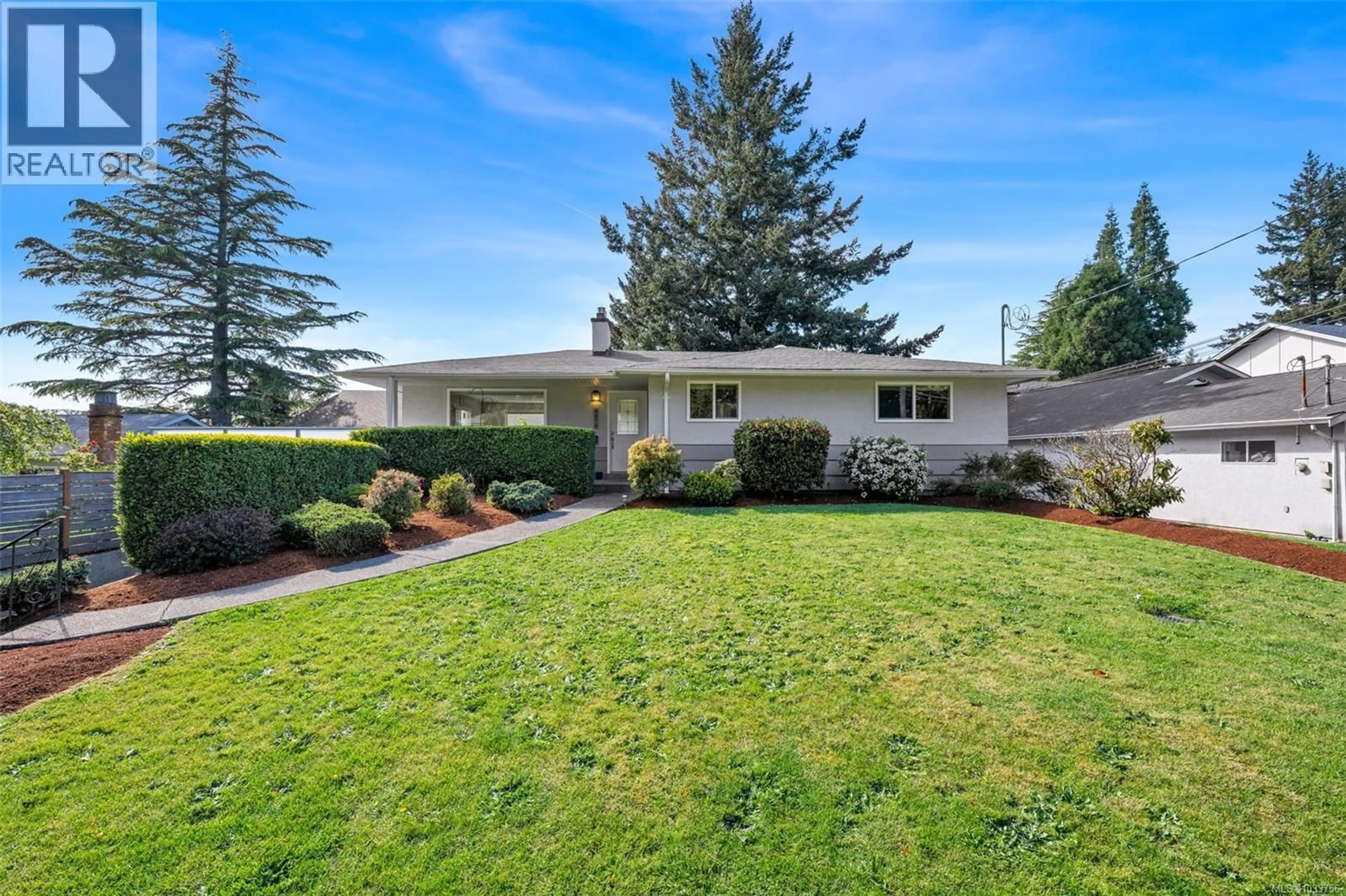 Home with vinyl exterior material, street for 4474 TORQUAY DRIVE, Saanich British Columbia V8N3L5