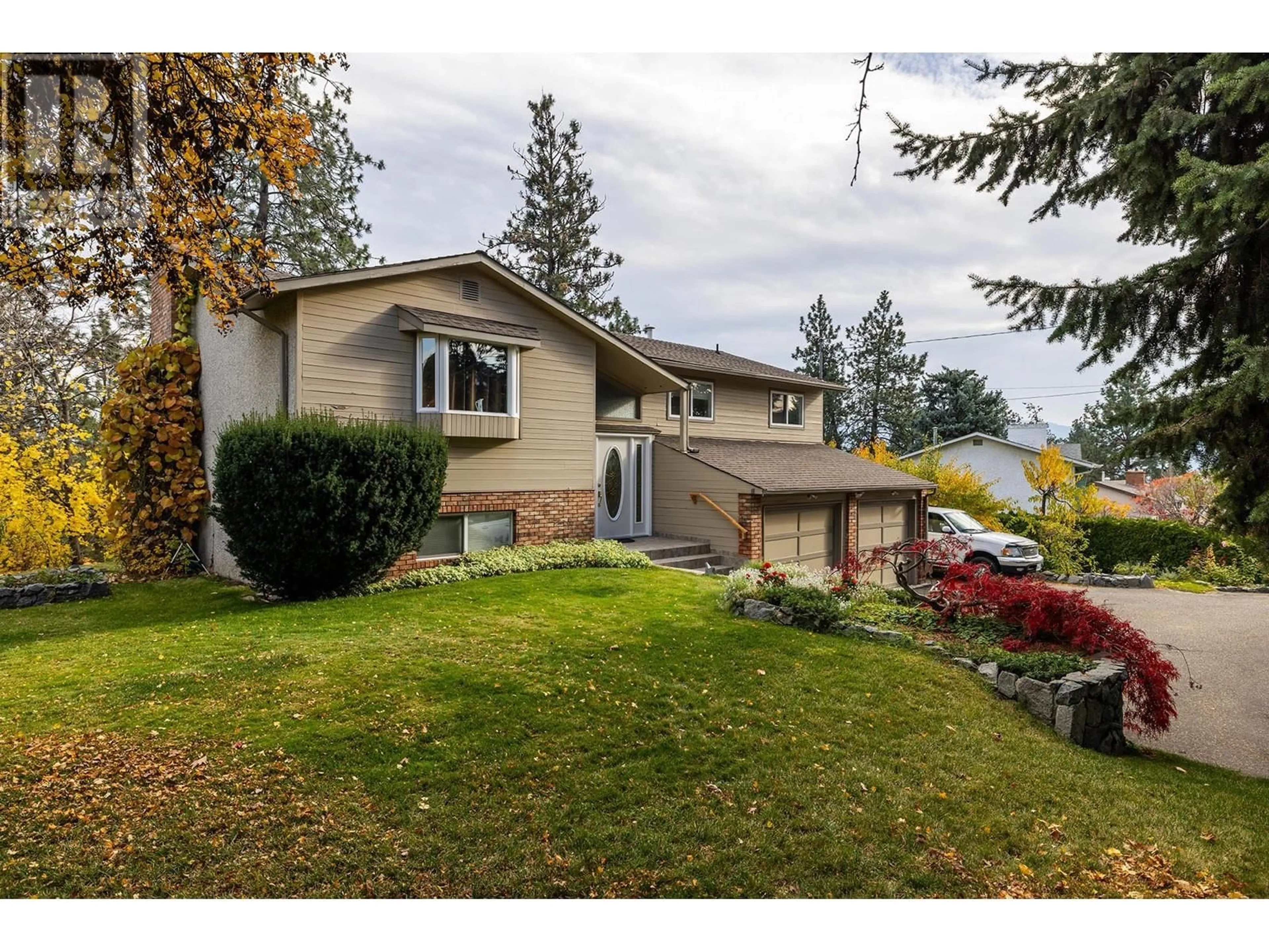 Home with vinyl exterior material, street for 3663 Inverness Road, West Kelowna British Columbia V4T1J5