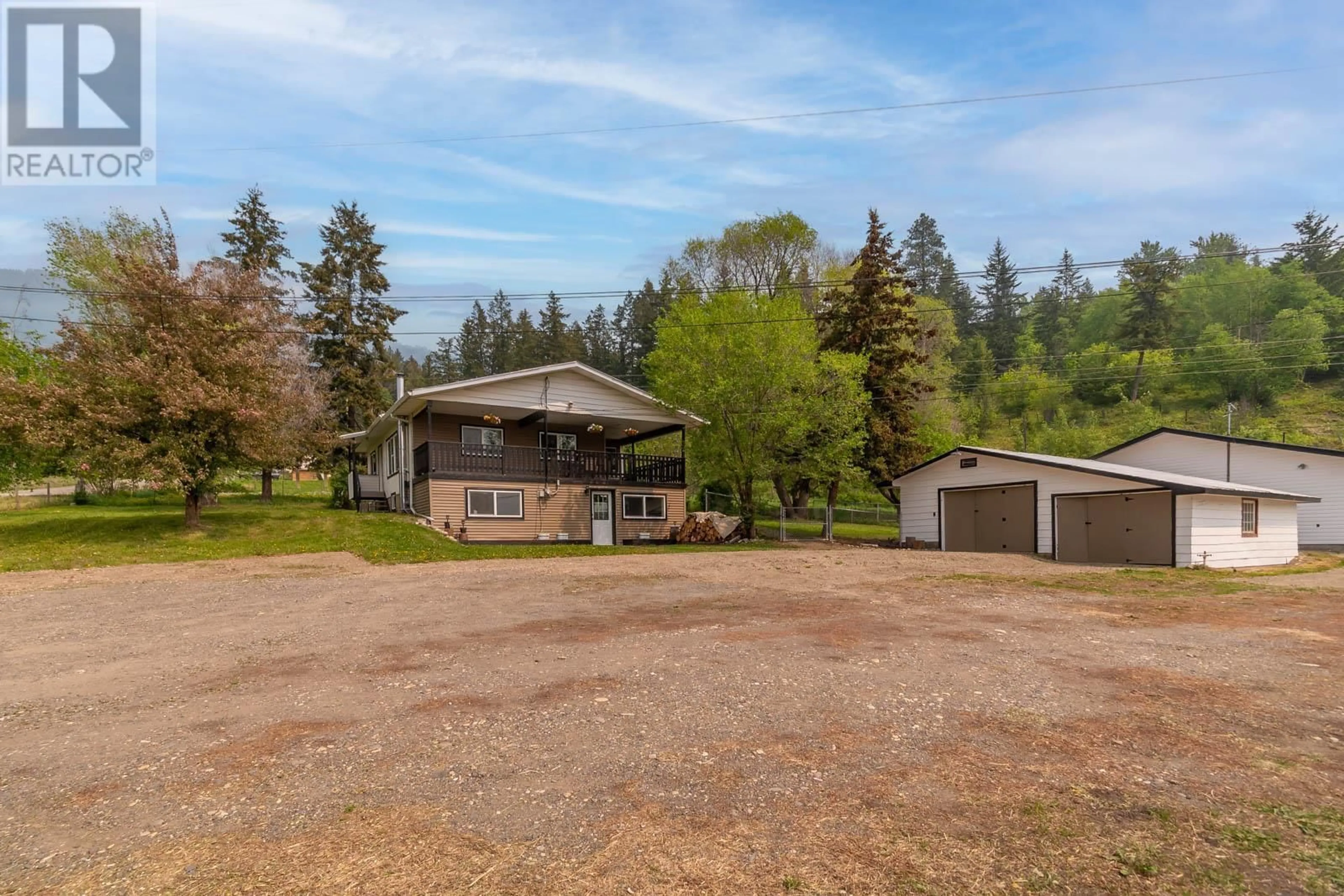 A pic from outside/outdoor area/front of a property/back of a property/a pic from drone, mountain view for 5479 SILVERNAILS ROAD, Falkland British Columbia V0E1W0