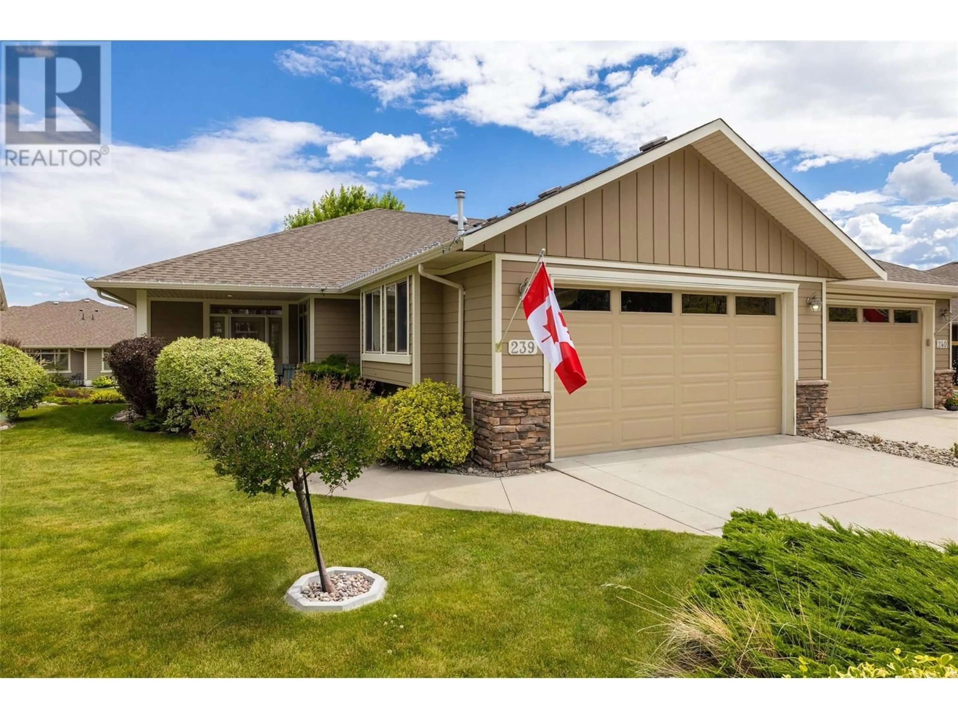 Home with vinyl exterior material, street for 239 - 4035 GELLATLY ROAD, West Kelowna British Columbia V4T1R7