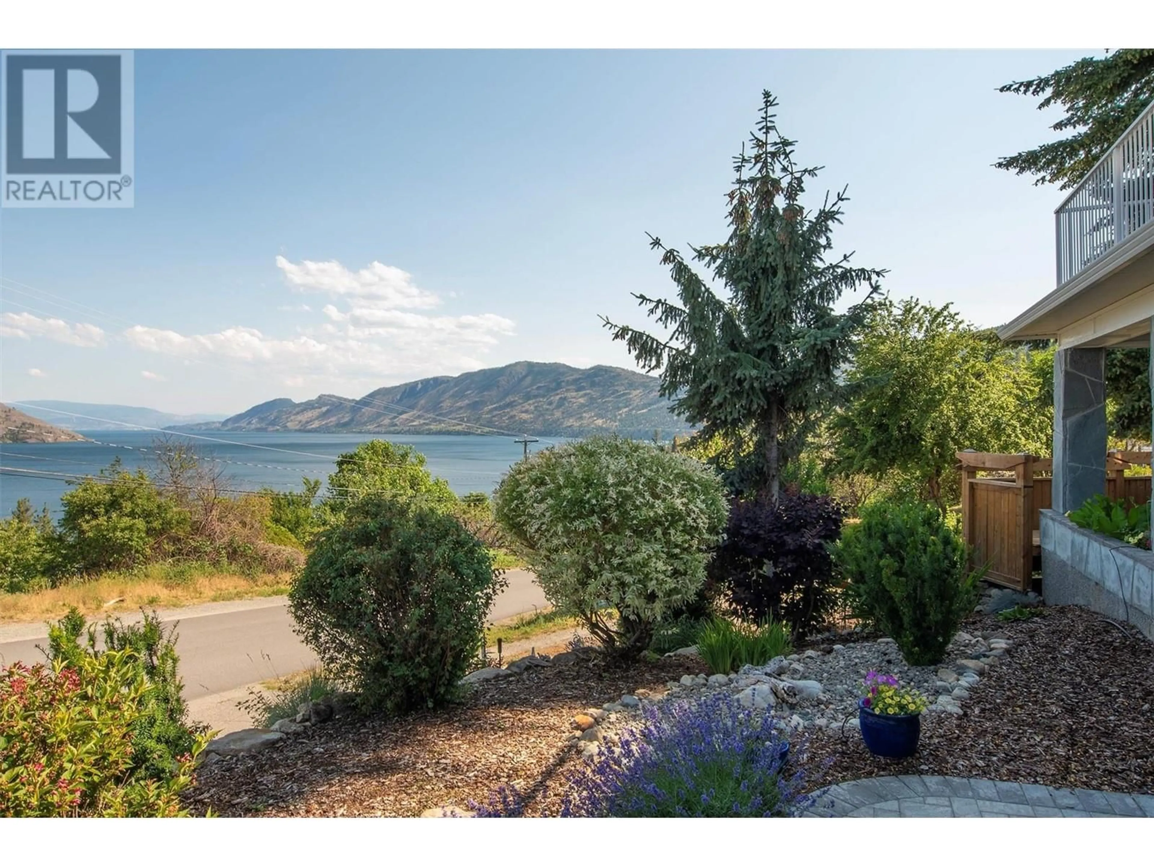 A pic from outside/outdoor area/front of a property/back of a property/a pic from drone, water/lake/river/ocean view for 6148 LIPSETT AVENUE, Peachland British Columbia V0H1X7