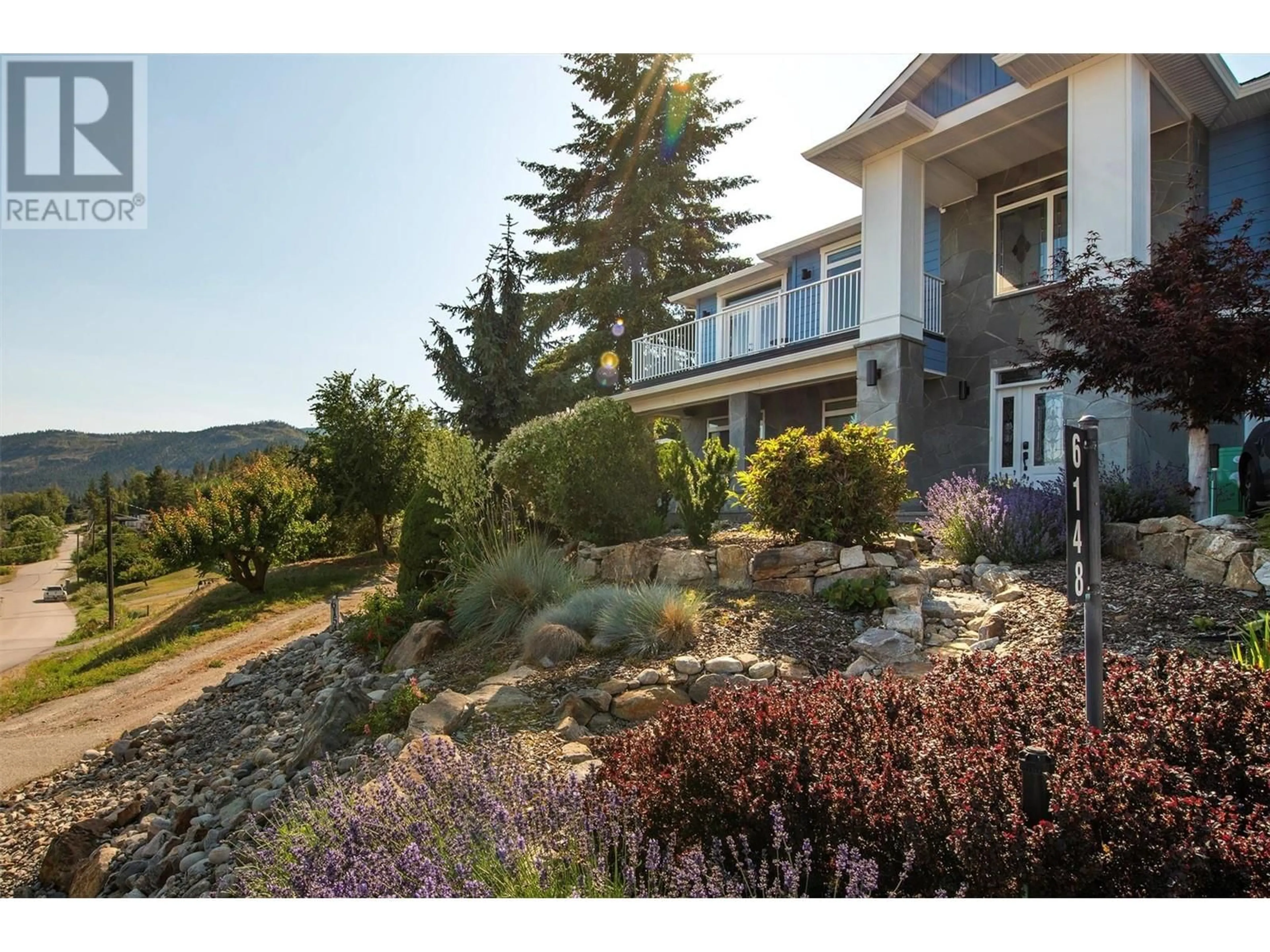 A pic from outside/outdoor area/front of a property/back of a property/a pic from drone, mountain view for 6148 LIPSETT AVENUE, Peachland British Columbia V0H1X7