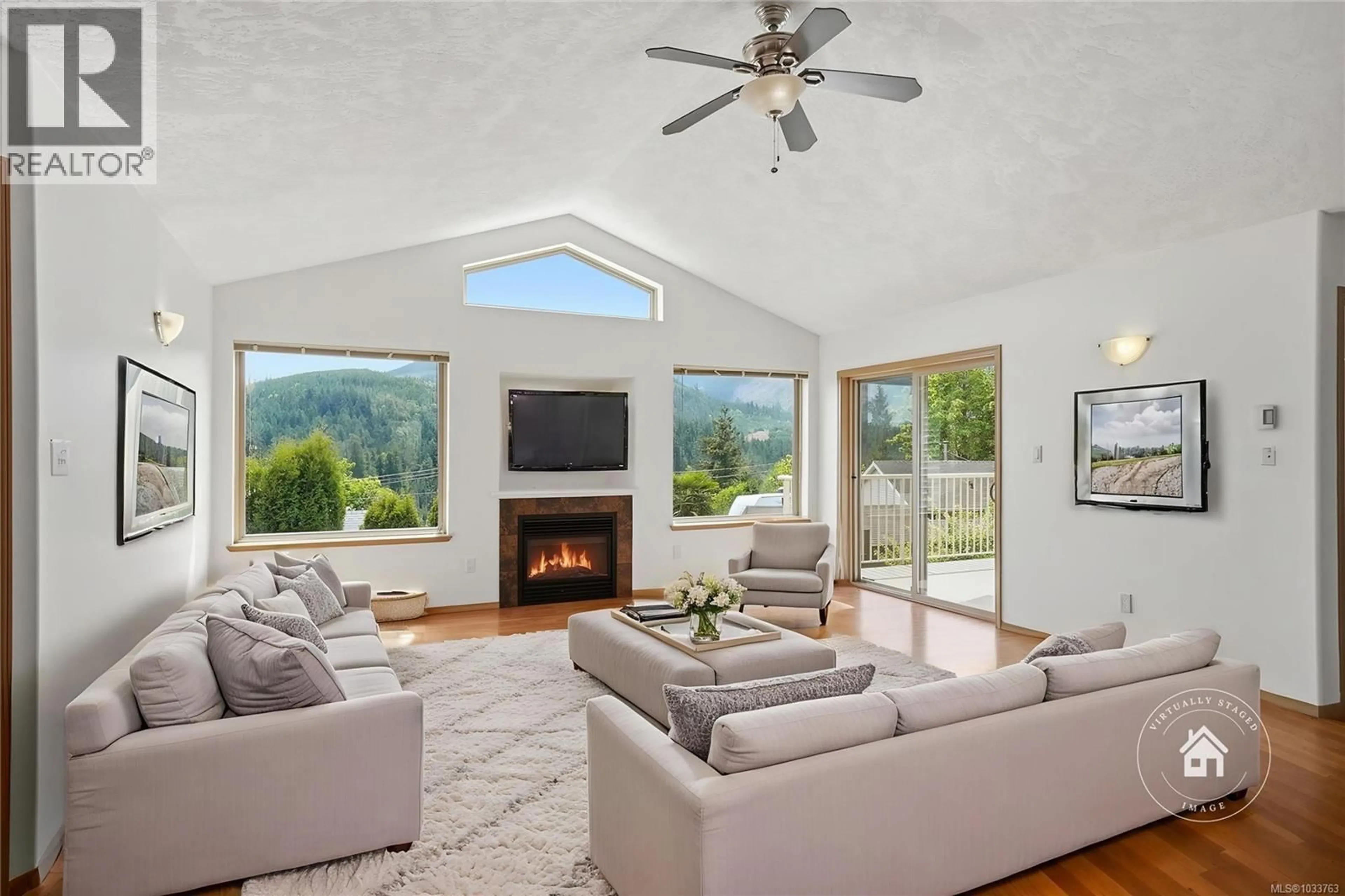 Living room with furniture, unknown for 1758 MARTINI WAY, Qualicum Beach British Columbia V9K2S3
