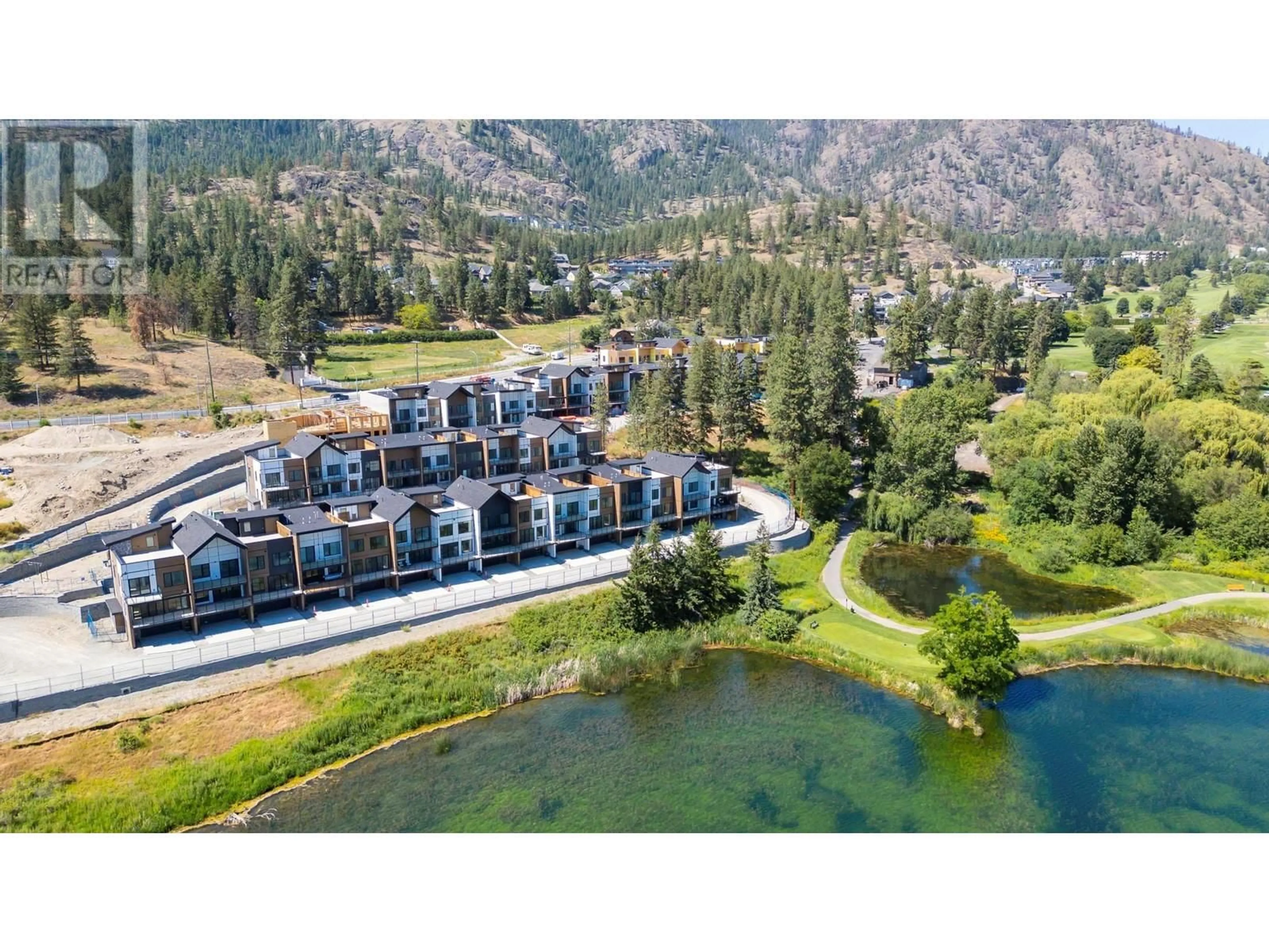 A pic from outside/outdoor area/front of a property/back of a property/a pic from drone, water/lake/river/ocean view for 209 - 2735 SHANNON LAKE ROAD, West Kelowna British Columbia V4T0G5