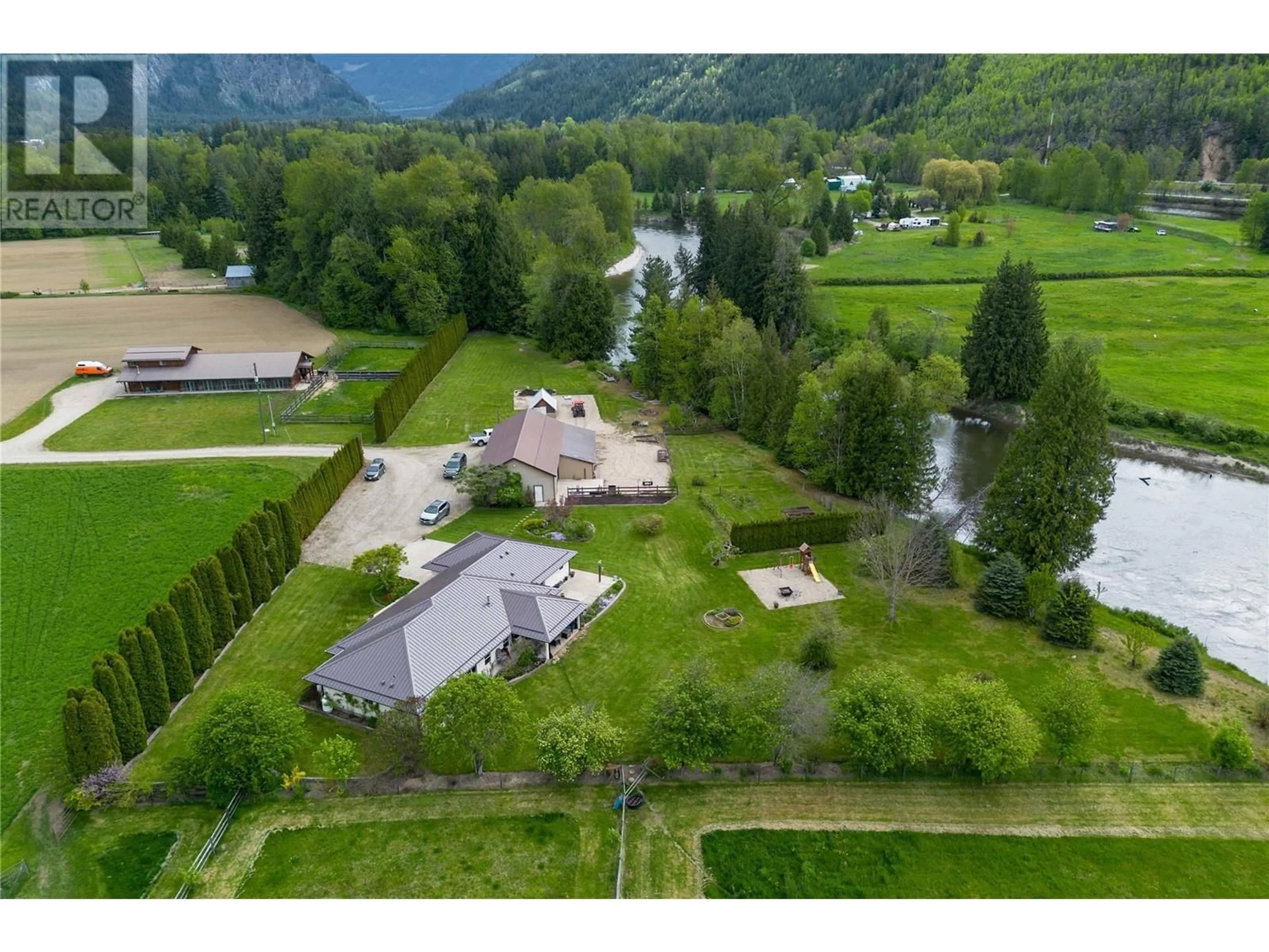 A pic from outside/outdoor area/front of a property/back of a property/a pic from drone, mountain view for 2170 CAMBIE SOLSQUA ROAD, Sicamous British Columbia V0E2V5