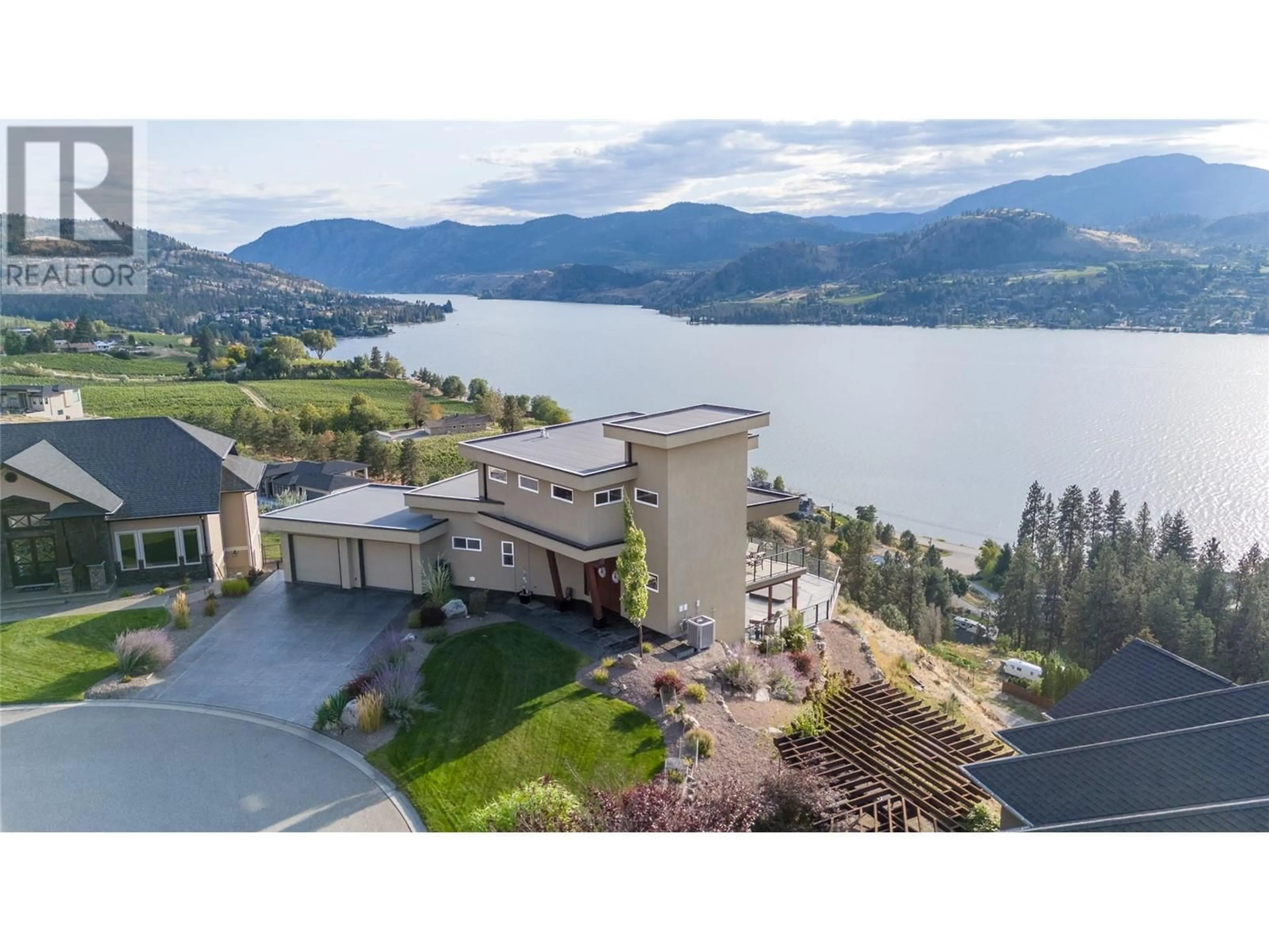 A pic from outside/outdoor area/front of a property/back of a property/a pic from drone, water/lake/river/ocean view for 174 VINTAGE BOULEVARD, Okanagan Falls British Columbia V0H1R3