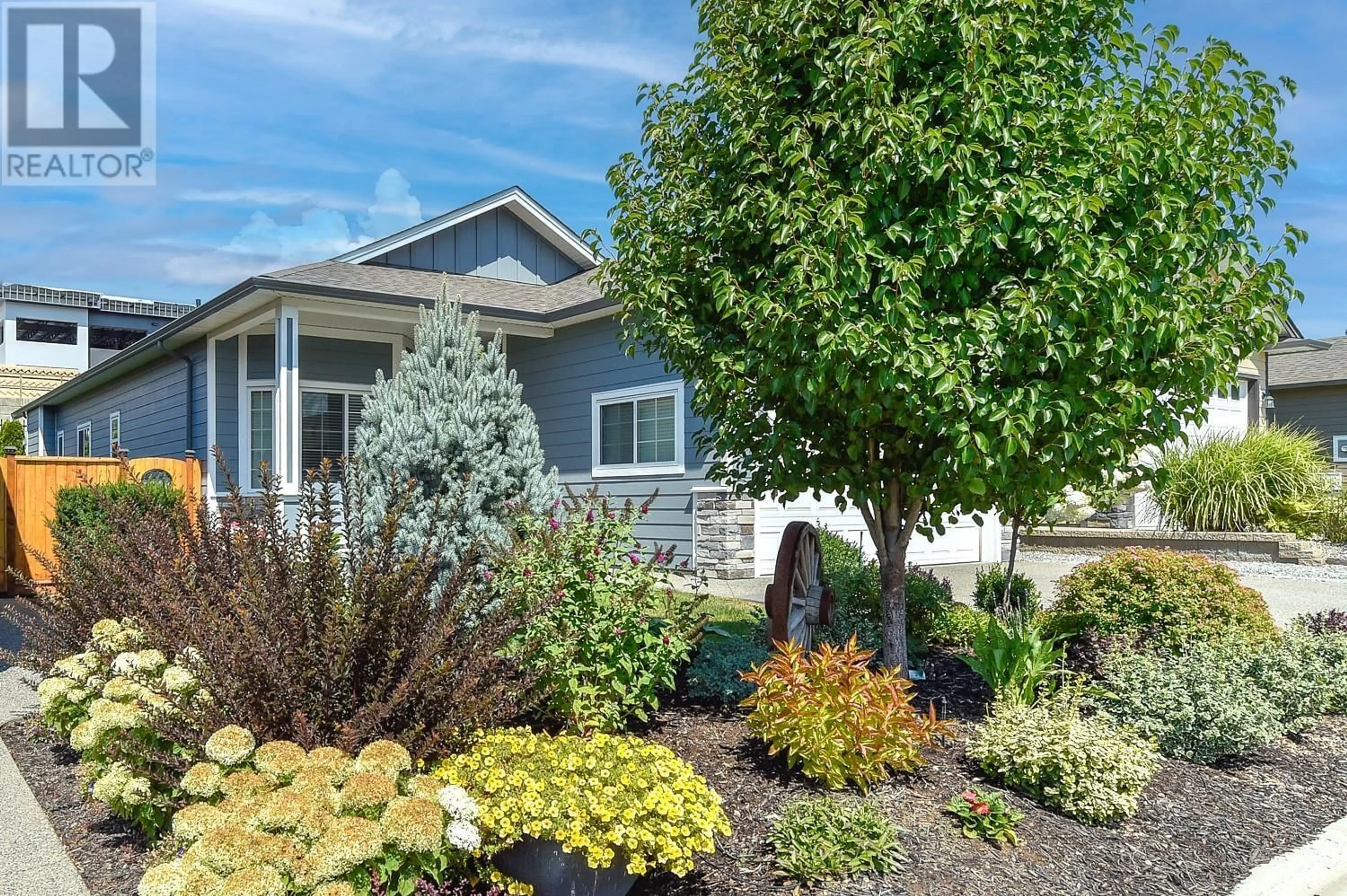 Home with vinyl exterior material, street for 2086 SAGE CRESCENT, West Kelowna British Columbia V4T3A5
