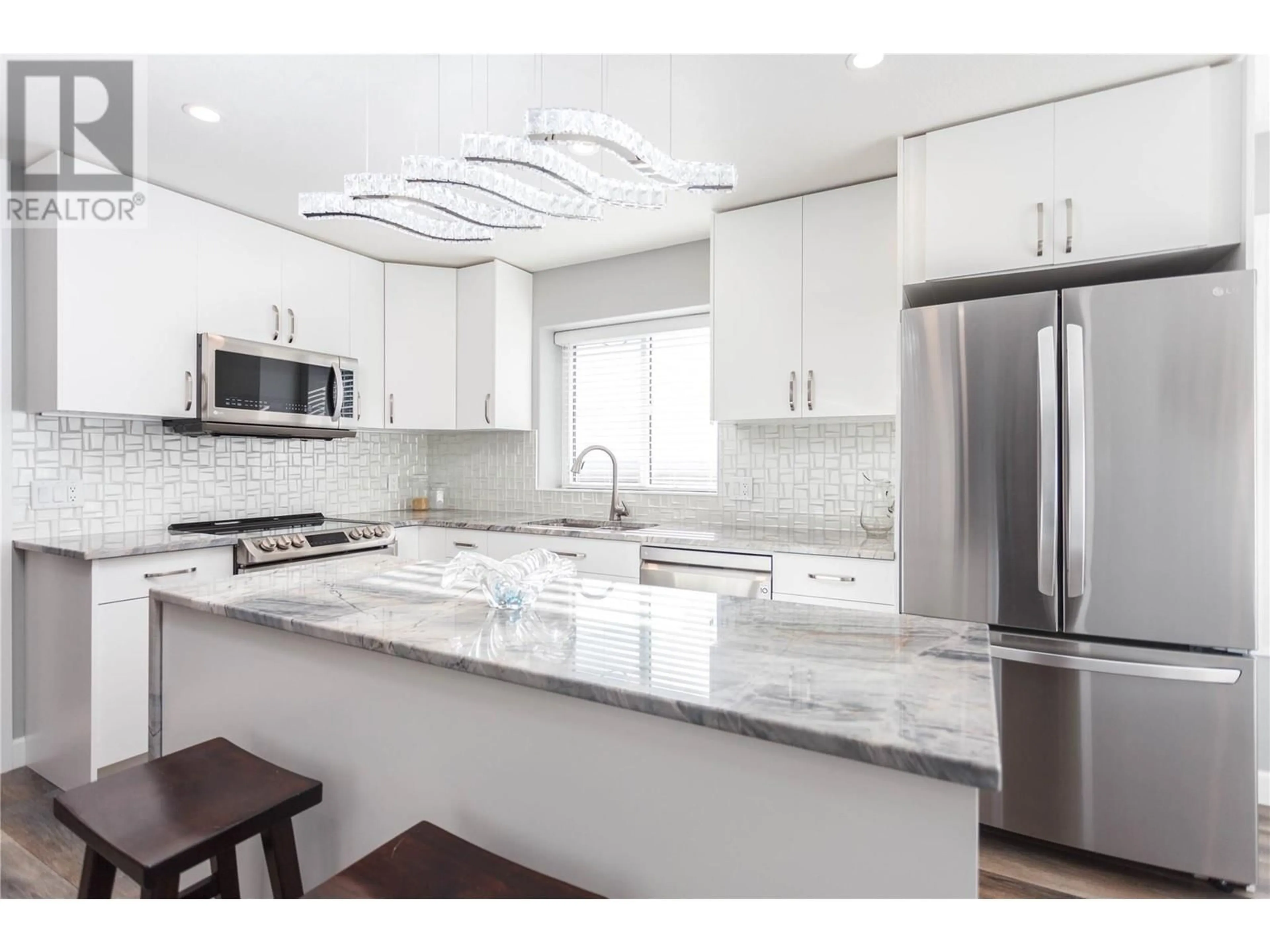 Open concept kitchen, ceramic/tile floor for 4 - 2675 PINE AVENUE, Lumby British Columbia V0E2G5