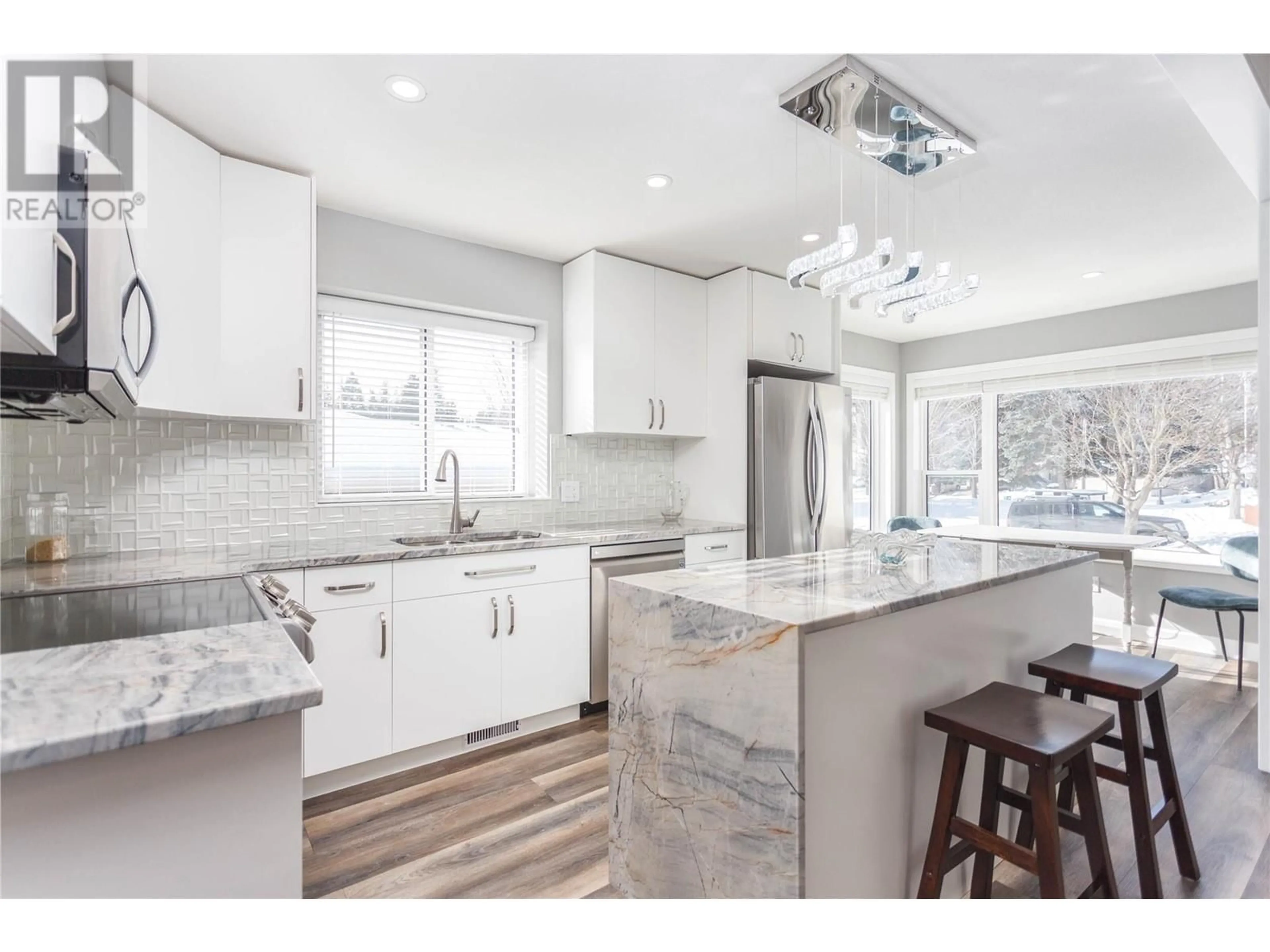 Open concept kitchen, ceramic/tile floor for 2675 Pine Avenue Unit# 4, Lumby British Columbia V0E2G5