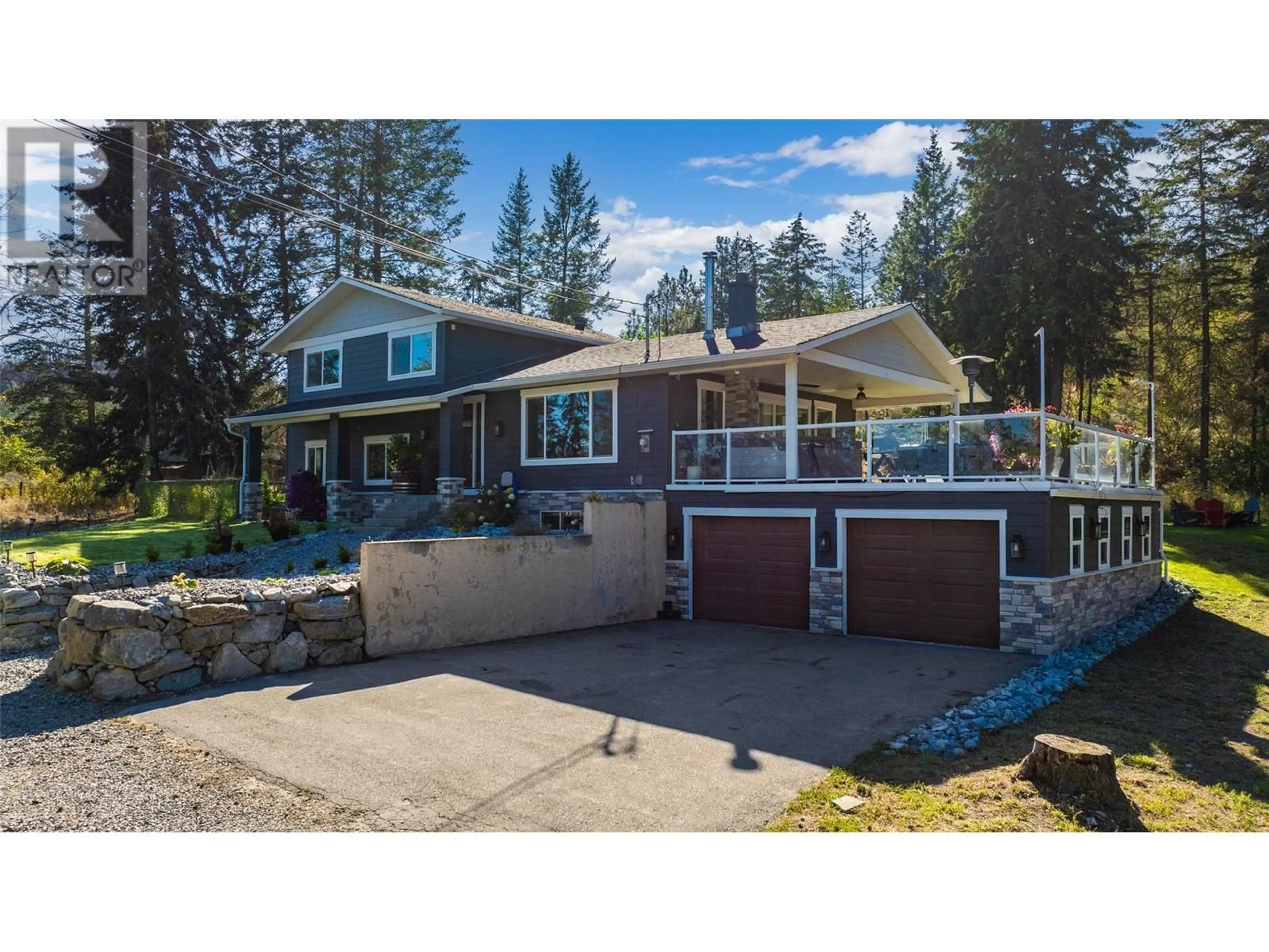 Home with vinyl exterior material, street for 9890 CHASE ROAD, Lake Country British Columbia V4T1P3