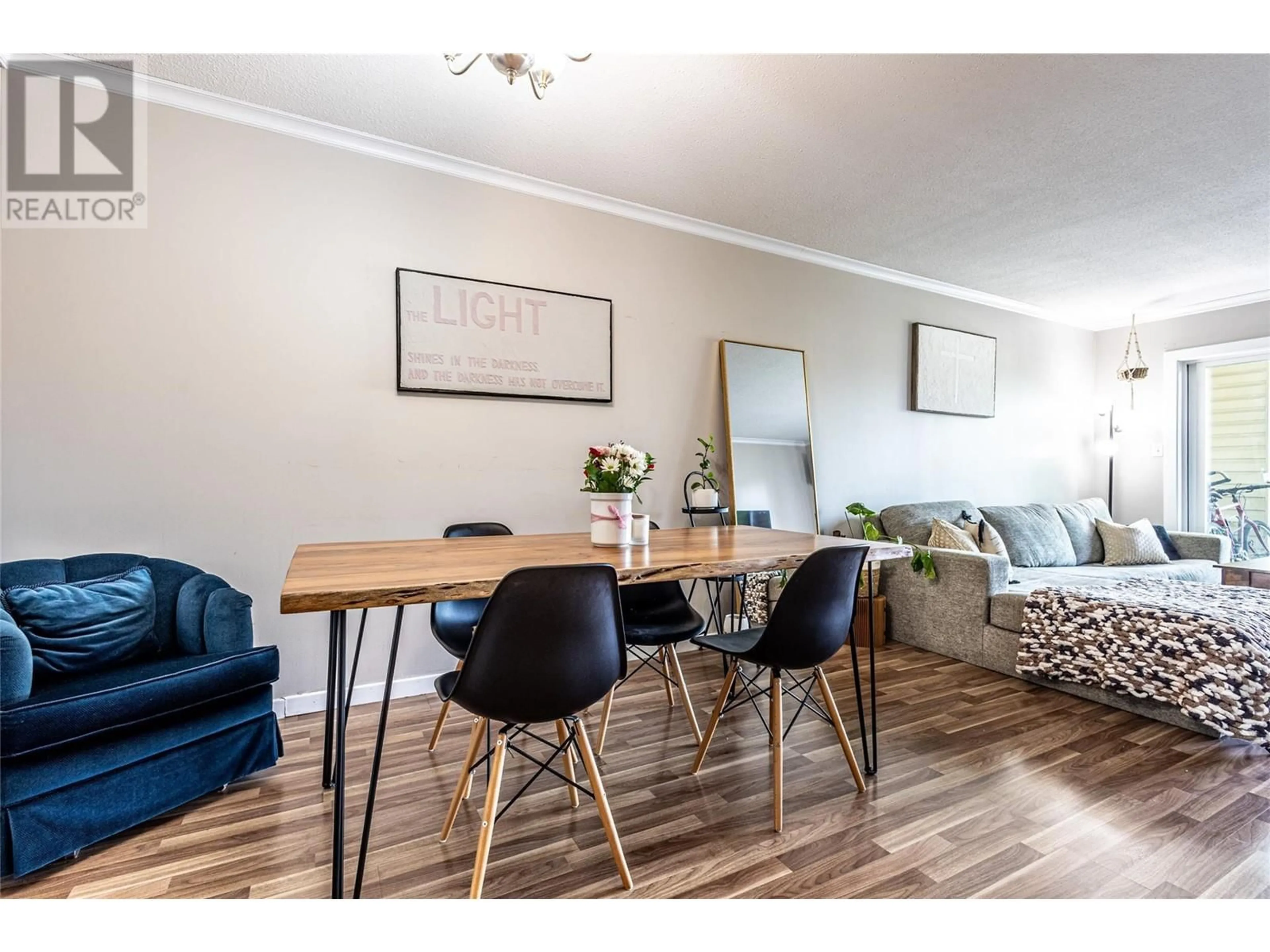 Dining room, wood/laminate floor for 314 - 769 KLO ROAD, Kelowna British Columbia V1Y9L9