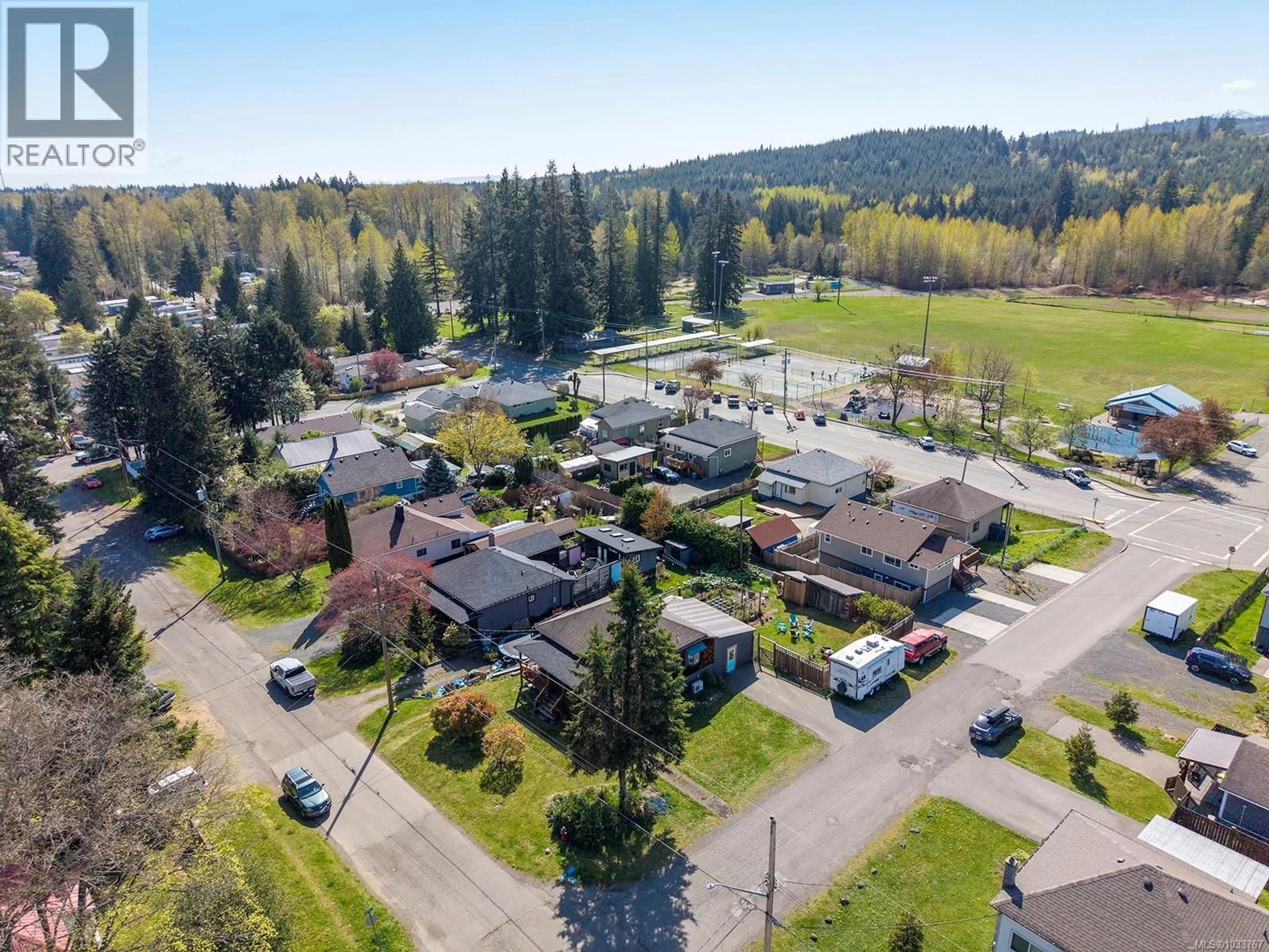 A pic from outside/outdoor area/front of a property/back of a property/a pic from drone, street for 2815 PENRITH AVENUE, Cumberland British Columbia V0R1S0