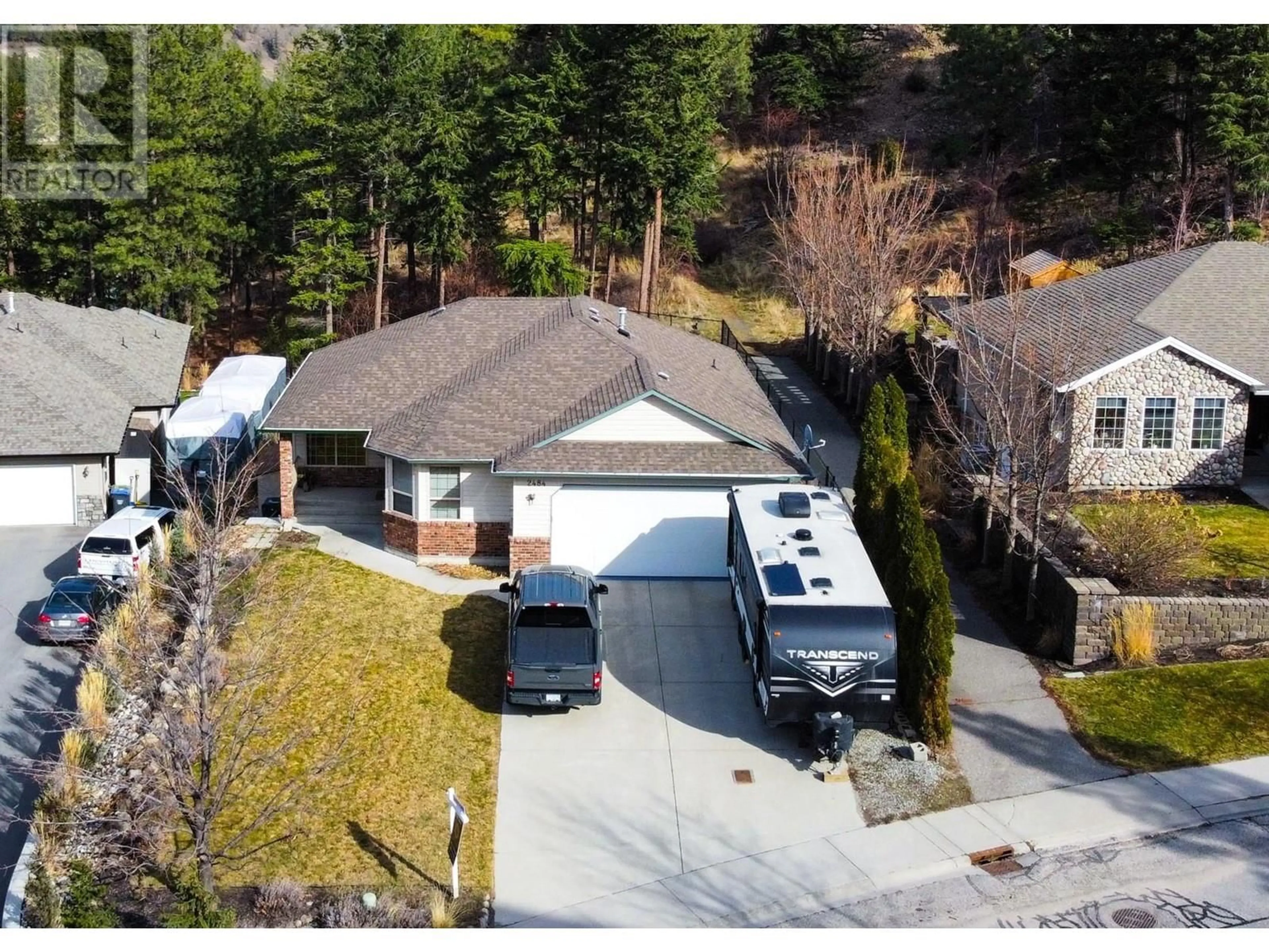 A pic from outside/outdoor area/front of a property/back of a property/a pic from drone, street for 2484 Shannon View Drive, West Kelowna British Columbia V4T2T3