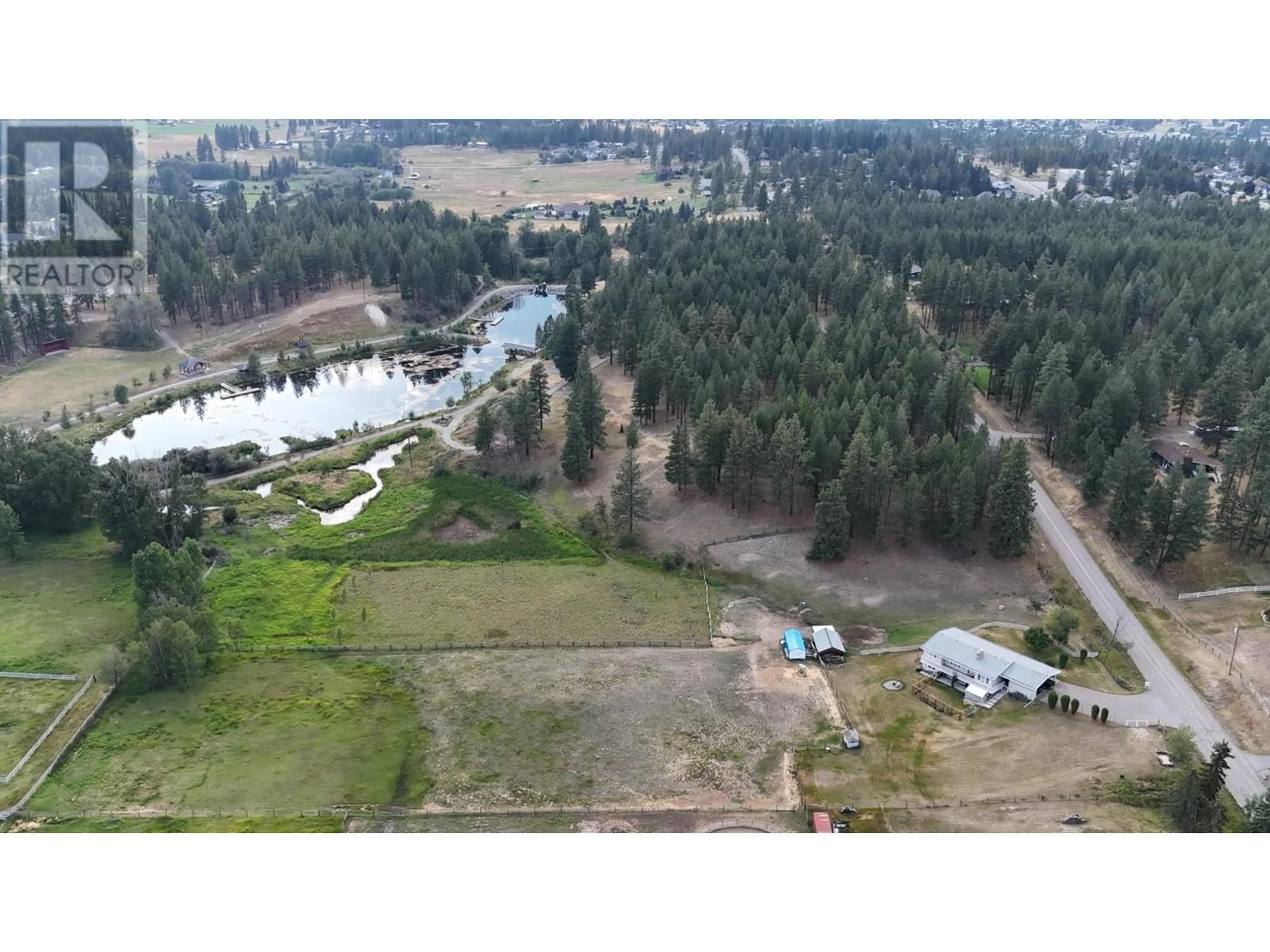 A pic from outside/outdoor area/front of a property/back of a property/a pic from drone, forest/trees view for 4001 9TH STREET SOUTH, Cranbrook British Columbia V1C7A8