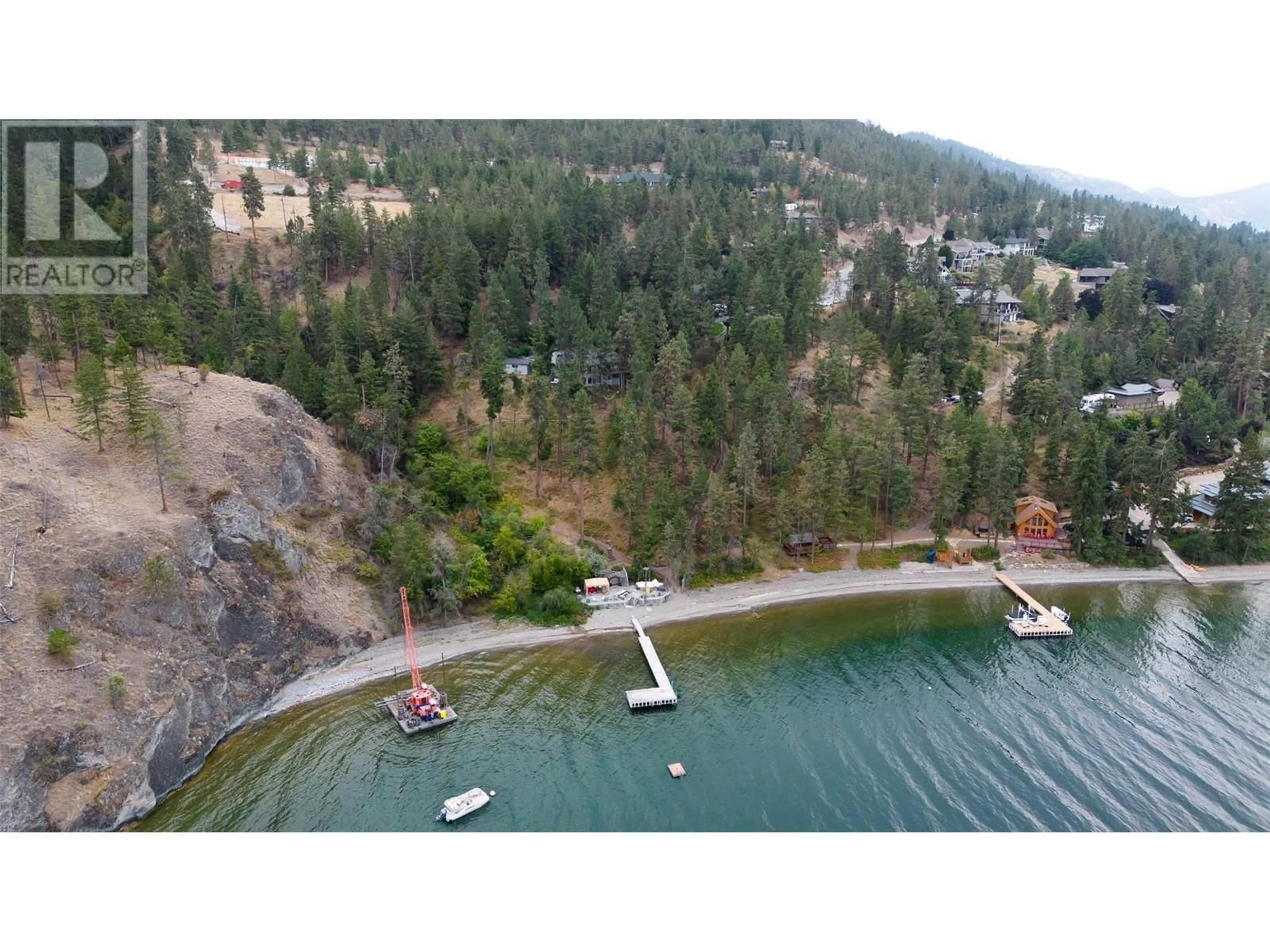 A pic from outside/outdoor area/front of a property/back of a property/a pic from drone, water/lake/river/ocean view for 2765 Arthur Road, Kelowna British Columbia V1V2B7