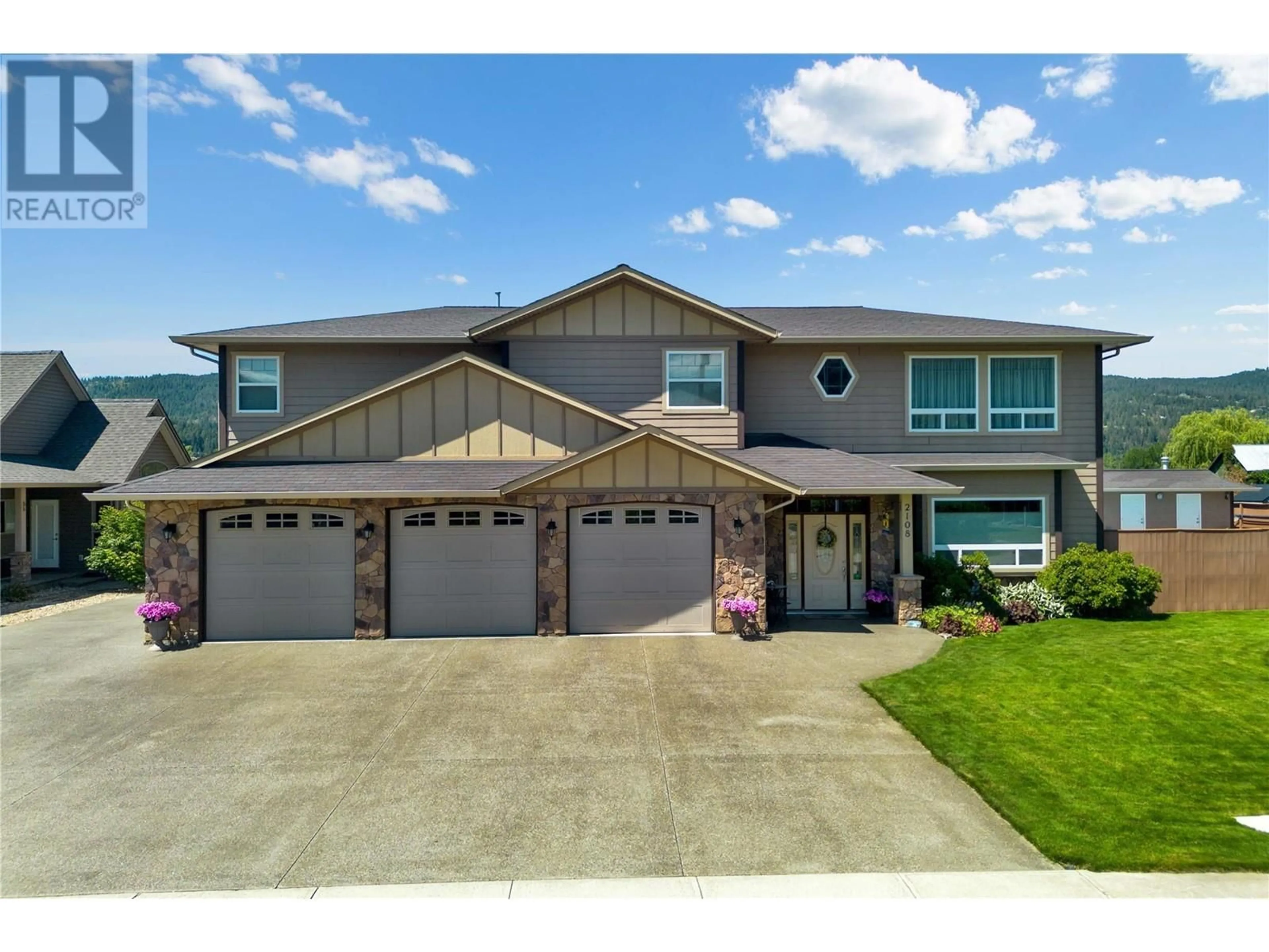 Home with vinyl exterior material, street for 2108 Waterwheel Street, Enderby British Columbia V0E1V2