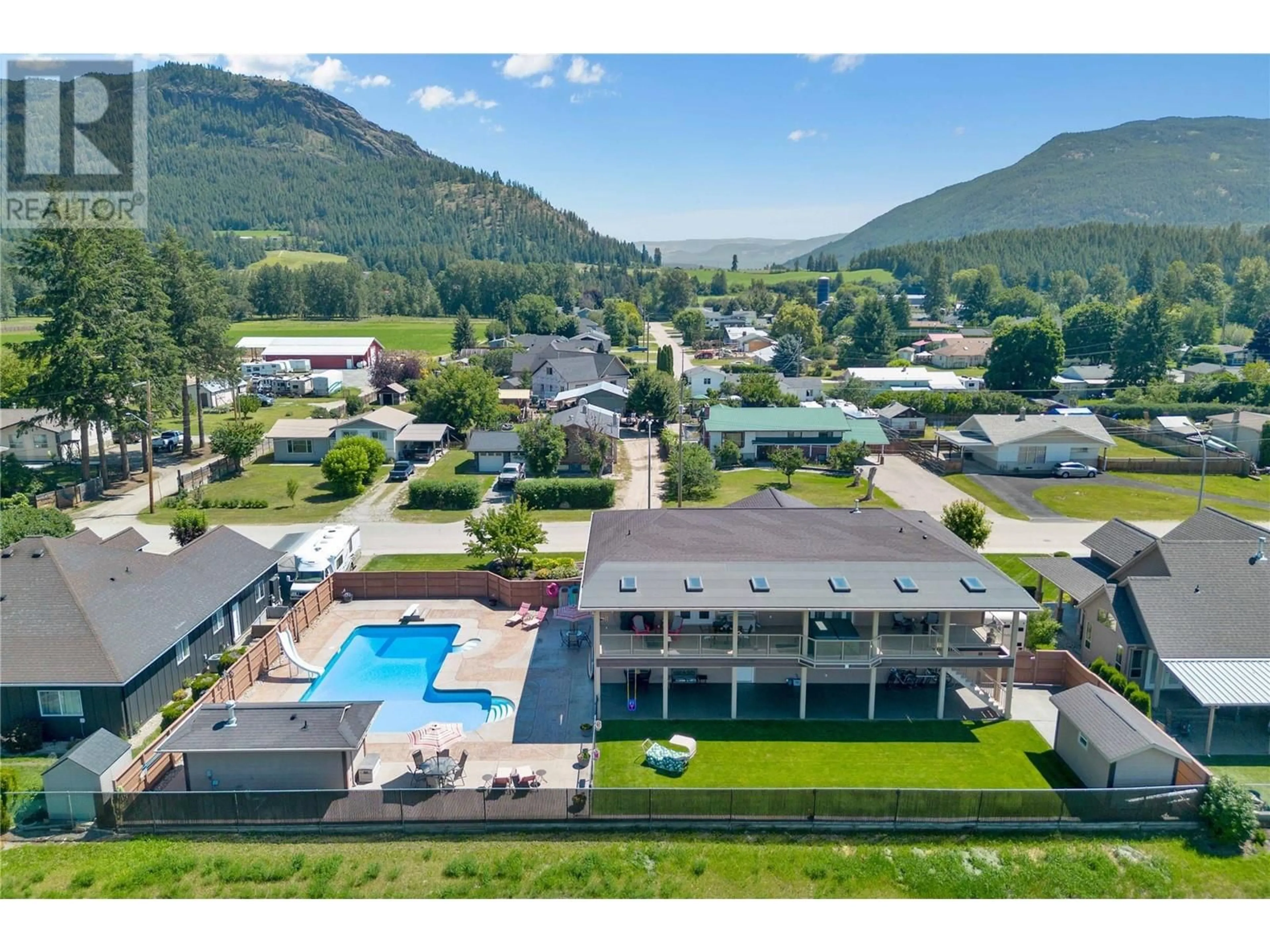 A pic from outside/outdoor area/front of a property/back of a property/a pic from drone, mountain view for 2108 Waterwheel Street, Enderby British Columbia V0E1V2