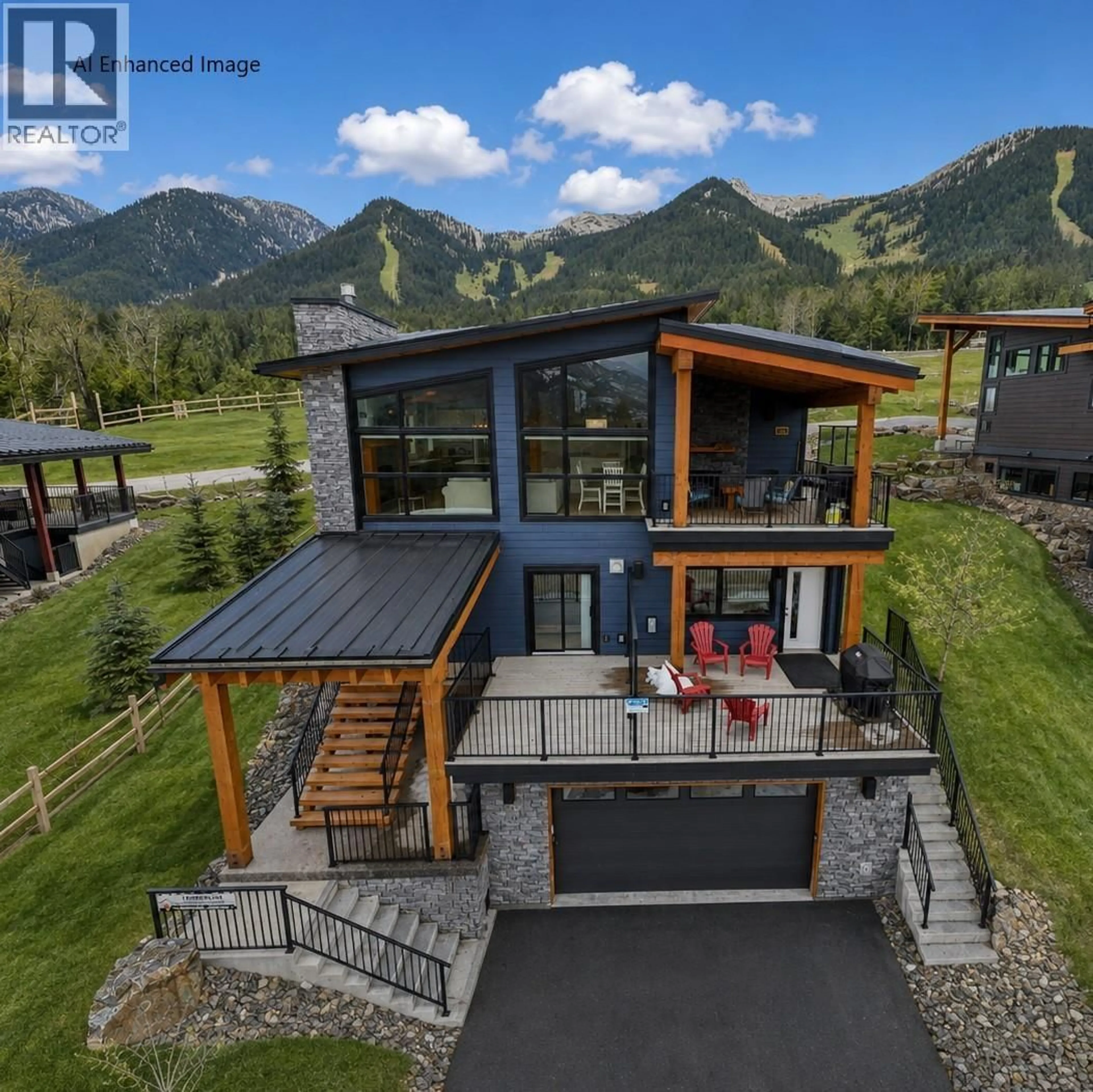 A pic from outside/outdoor area/front of a property/back of a property/a pic from drone, mountain view for 5418 RESORT DRIVE, Fernie British Columbia V0B1M6