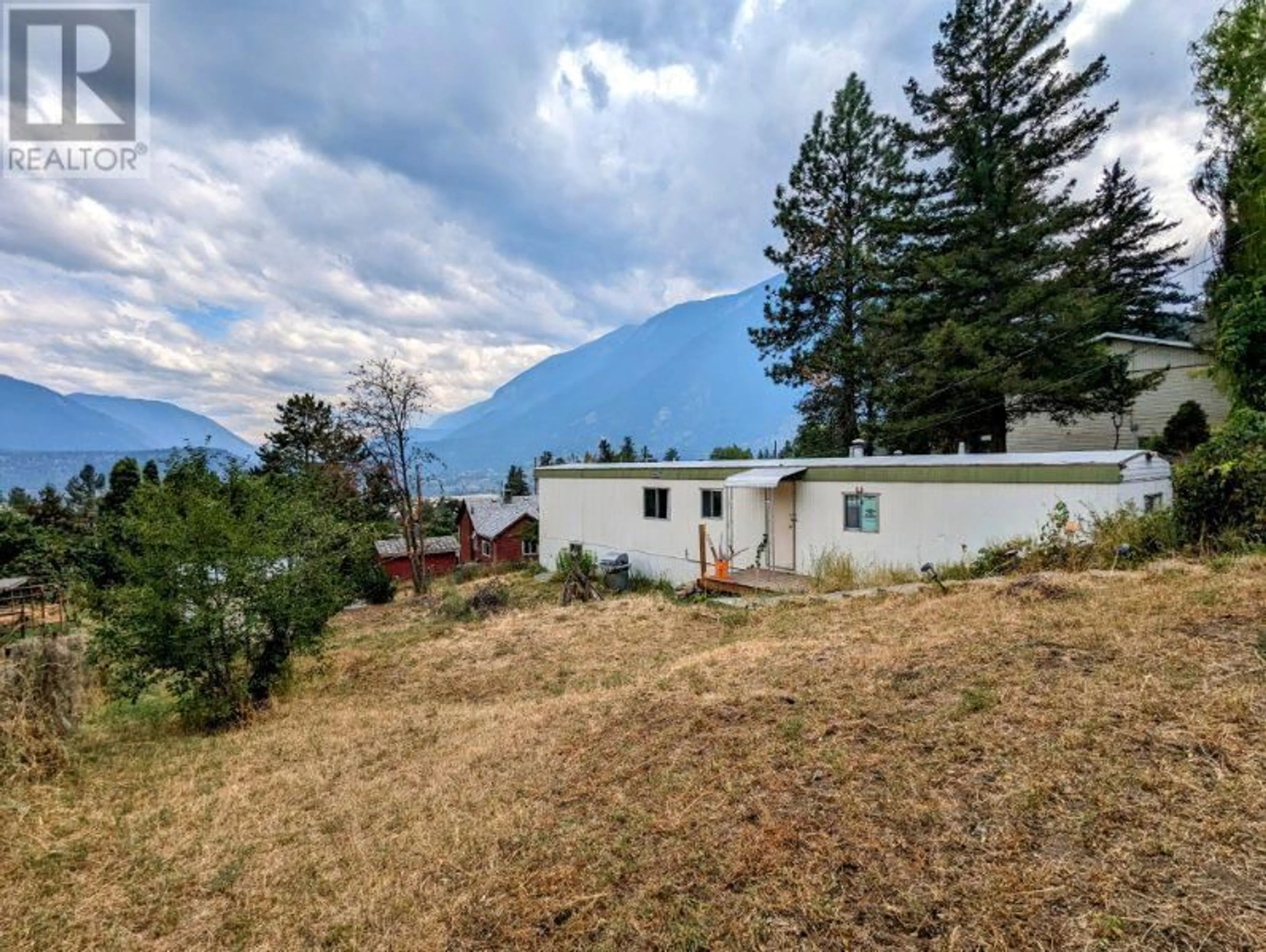 A pic from outside/outdoor area/front of a property/back of a property/a pic from drone, mountain view for 618 Victoria Street, Lillooet British Columbia V0K2E3