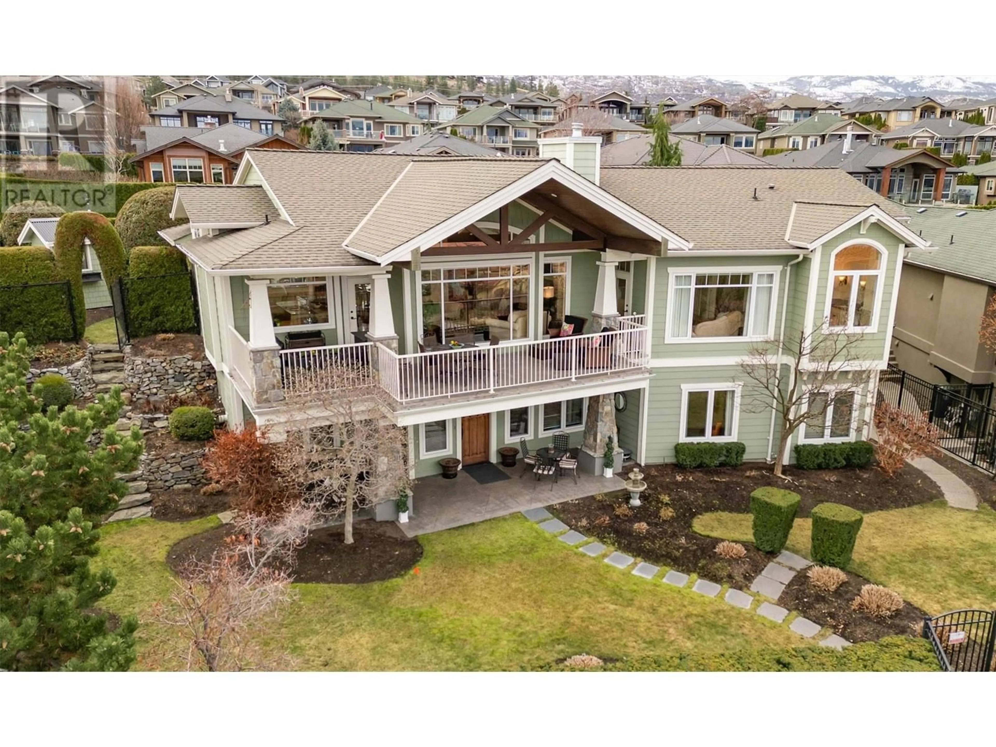 A pic from outside/outdoor area/front of a property/back of a property/a pic from drone, mountain view for 673 Almandine Court, Kelowna British Columbia V1W4Z5