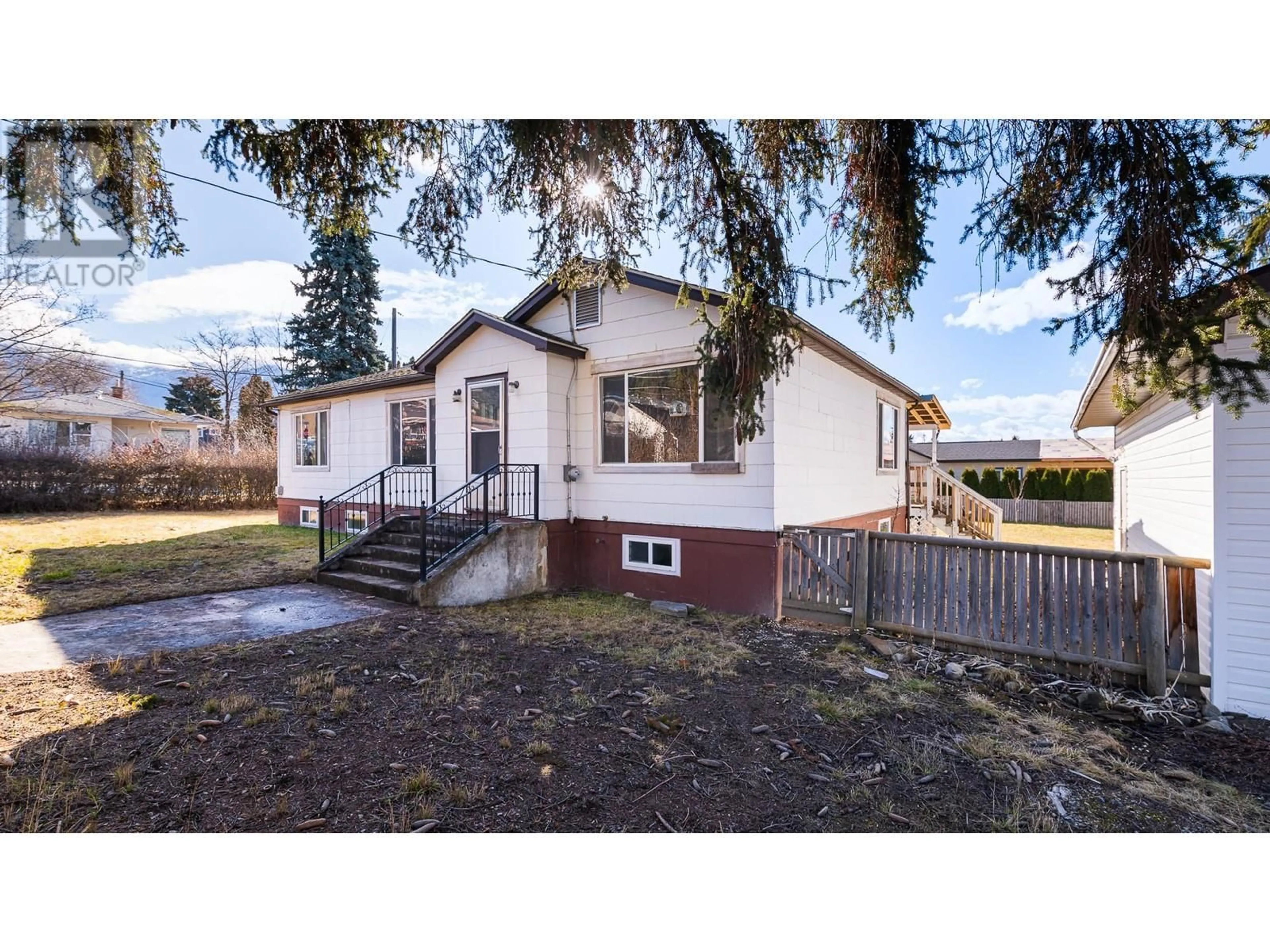 A pic from outside/outdoor area/front of a property/back of a property/a pic from drone, street for 205 19TH Avenue S, Creston British Columbia V0B1G5