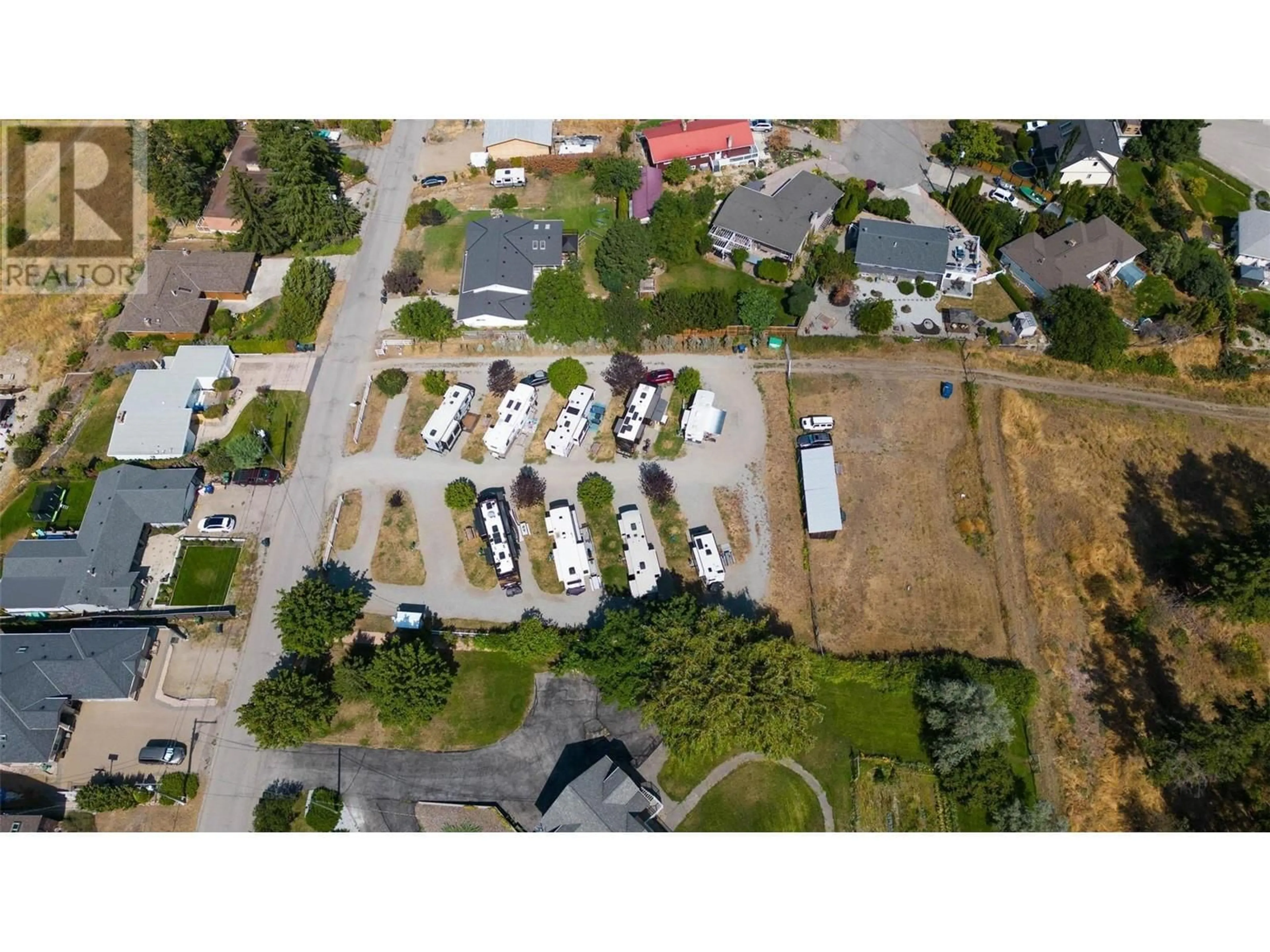 A pic from outside/outdoor area/front of a property/back of a property/a pic from drone, street for 15829 GREENHOW ROAD, Lake Country British Columbia V4V2E6