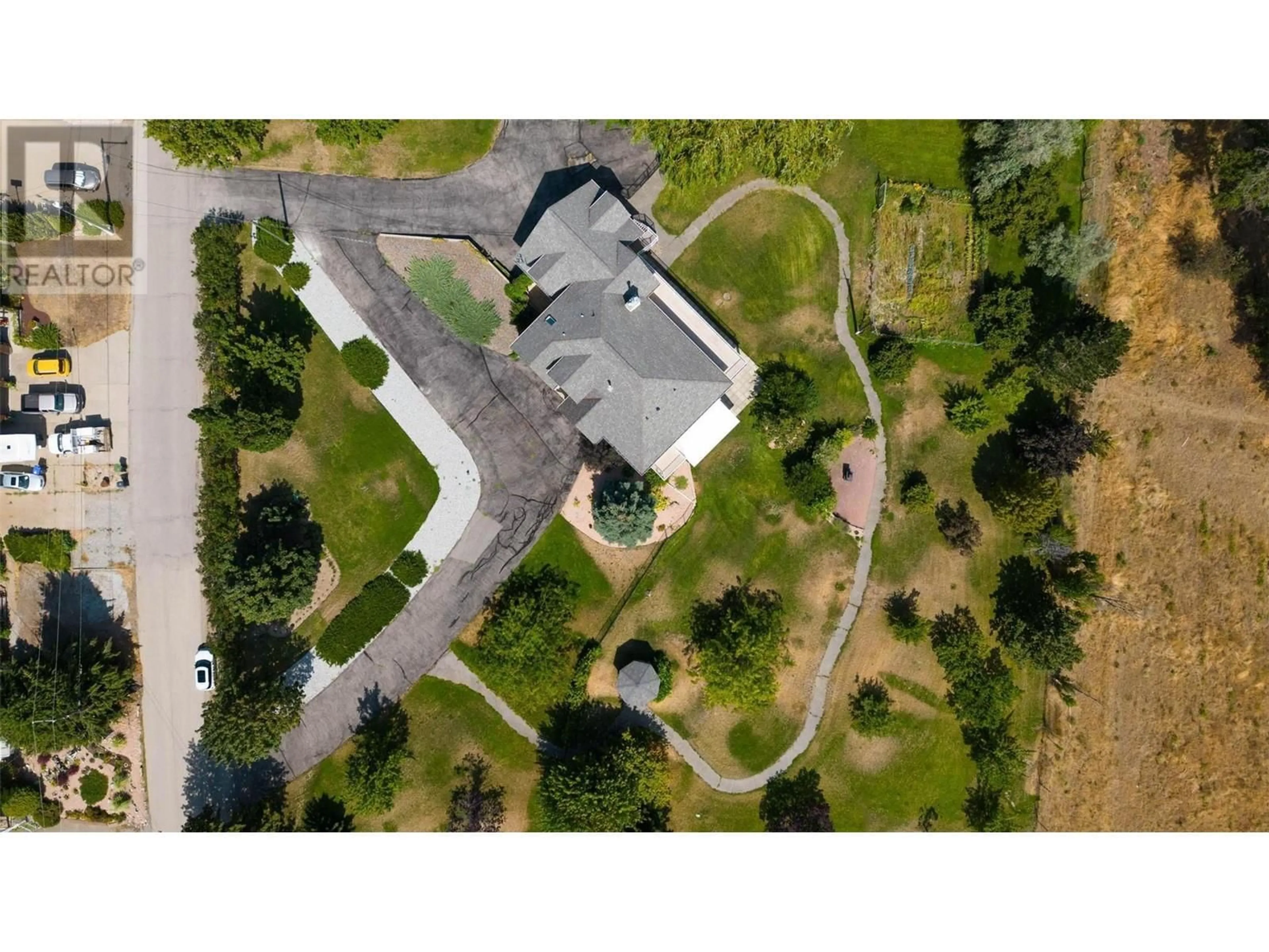 A pic from outside/outdoor area/front of a property/back of a property/a pic from drone, unknown for 15829 GREENHOW ROAD, Lake Country British Columbia V4V2E6