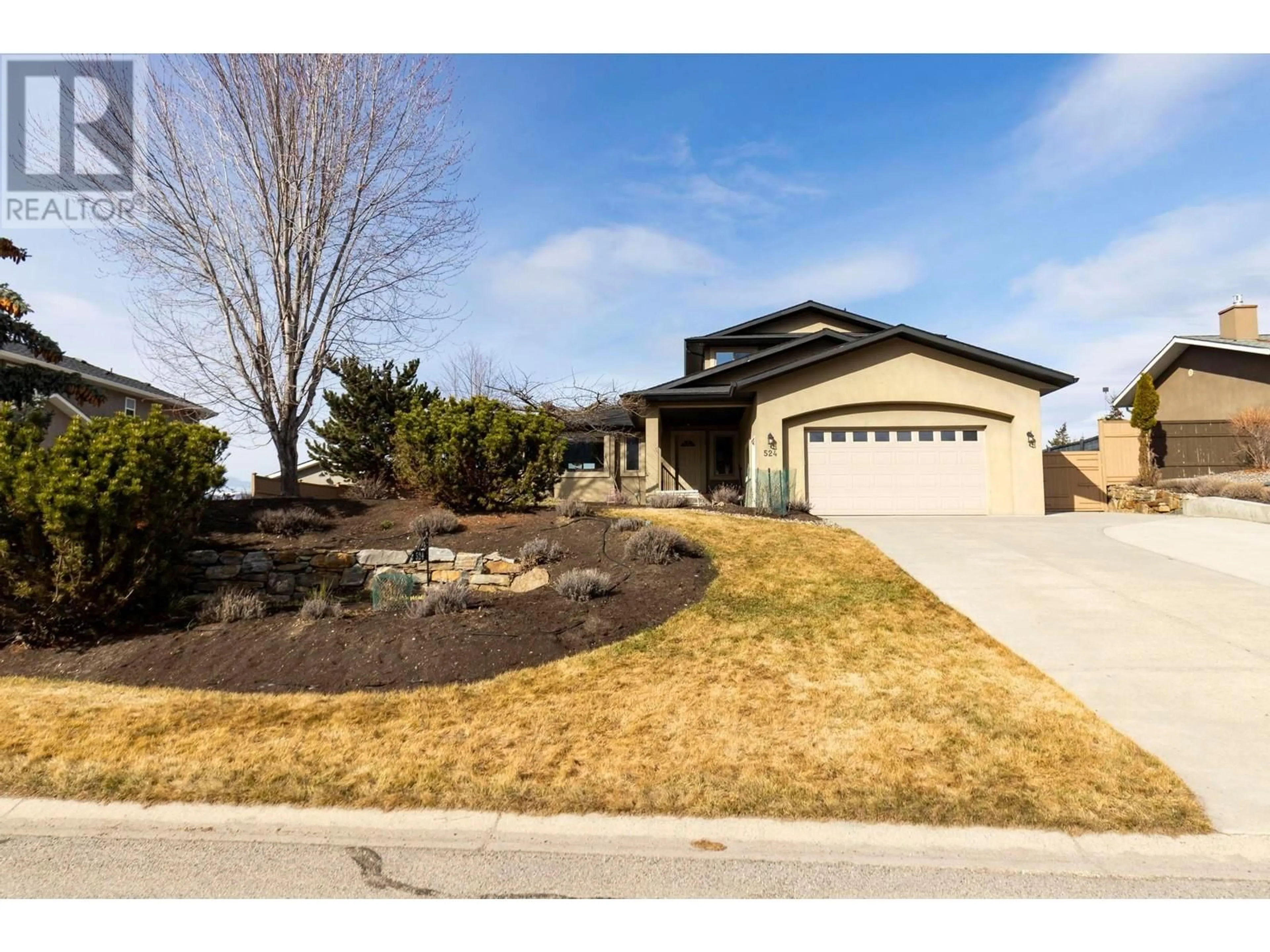 Home with brick exterior material, street for 524 Curlew Drive, Kelowna British Columbia V1W4M2