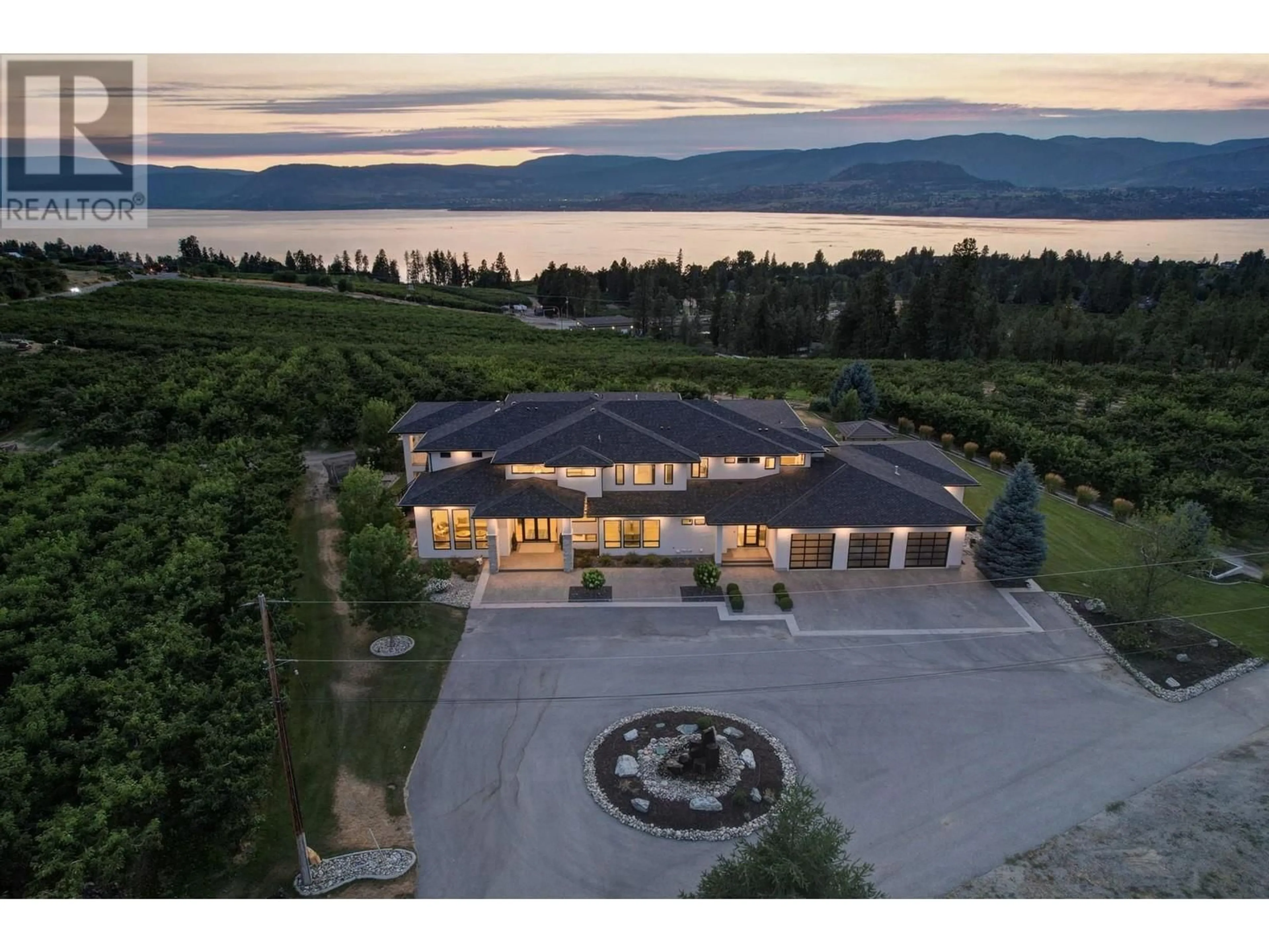 A pic from outside/outdoor area/front of a property/back of a property/a pic from drone, mountain view for 590 BARNABY ROAD, Kelowna British Columbia V1W4N7