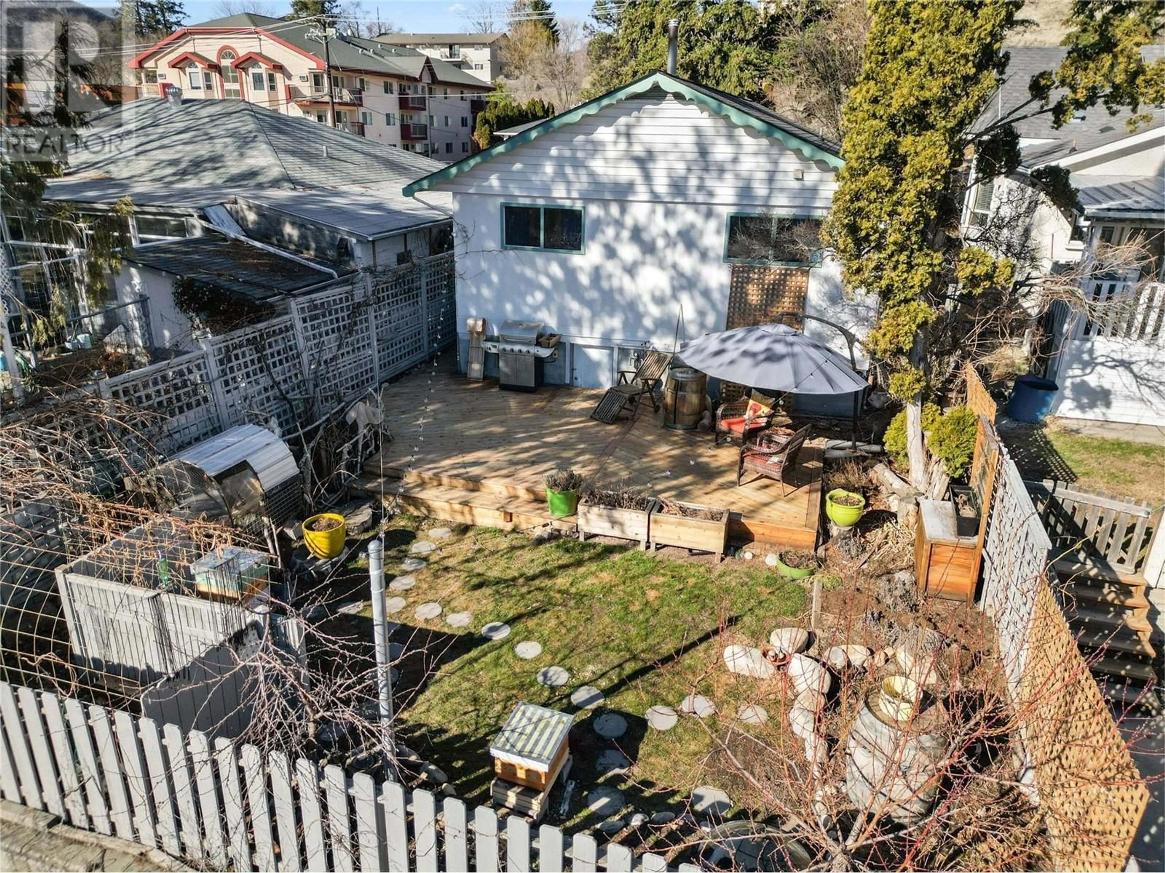 A pic from outside/outdoor area/front of a property/back of a property/a pic from drone, street for 614 Wade Avenue E, Penticton British Columbia V2A1T4