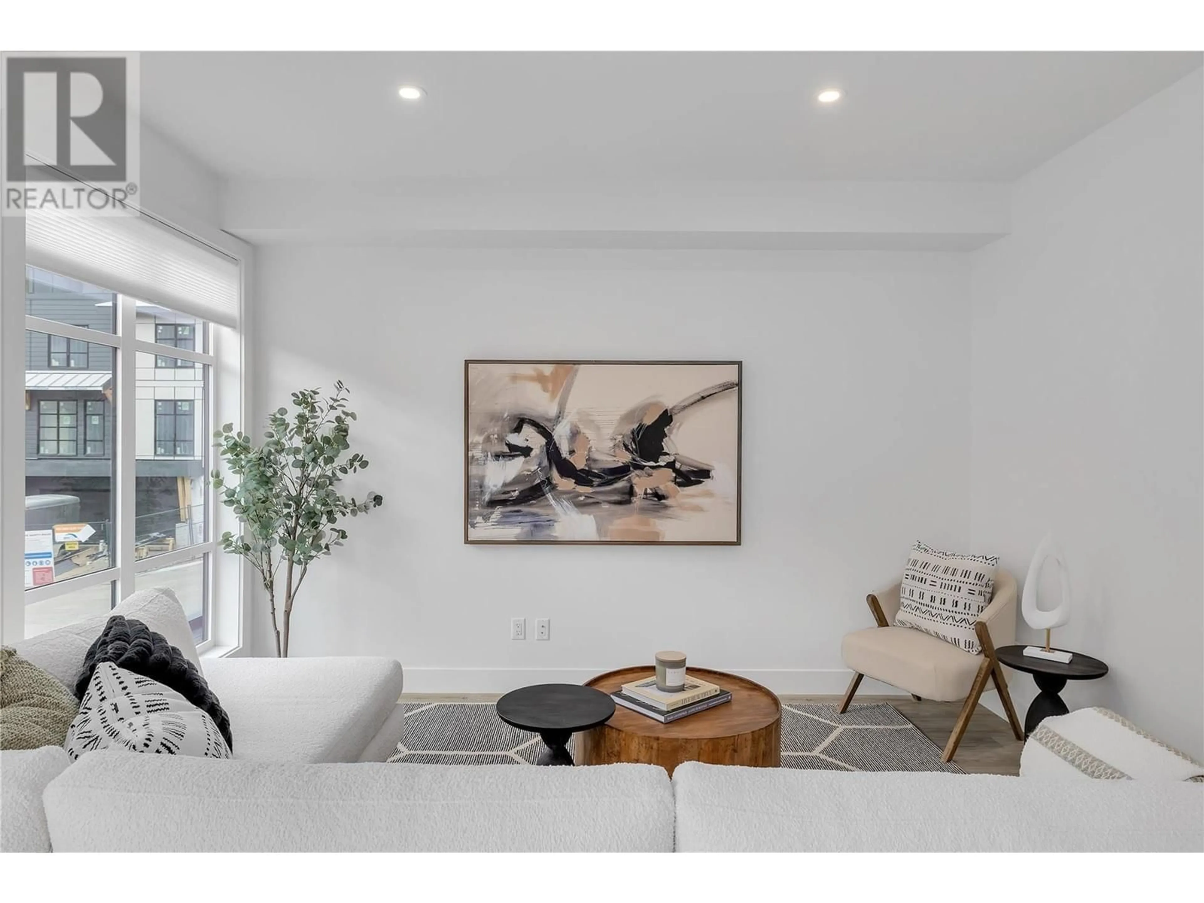 A pic from outside/outdoor area/front of a property/back of a property/a pic from drone, unknown for 106 - 1455 CARA GLEN COURT, Kelowna British Columbia V1V3B8