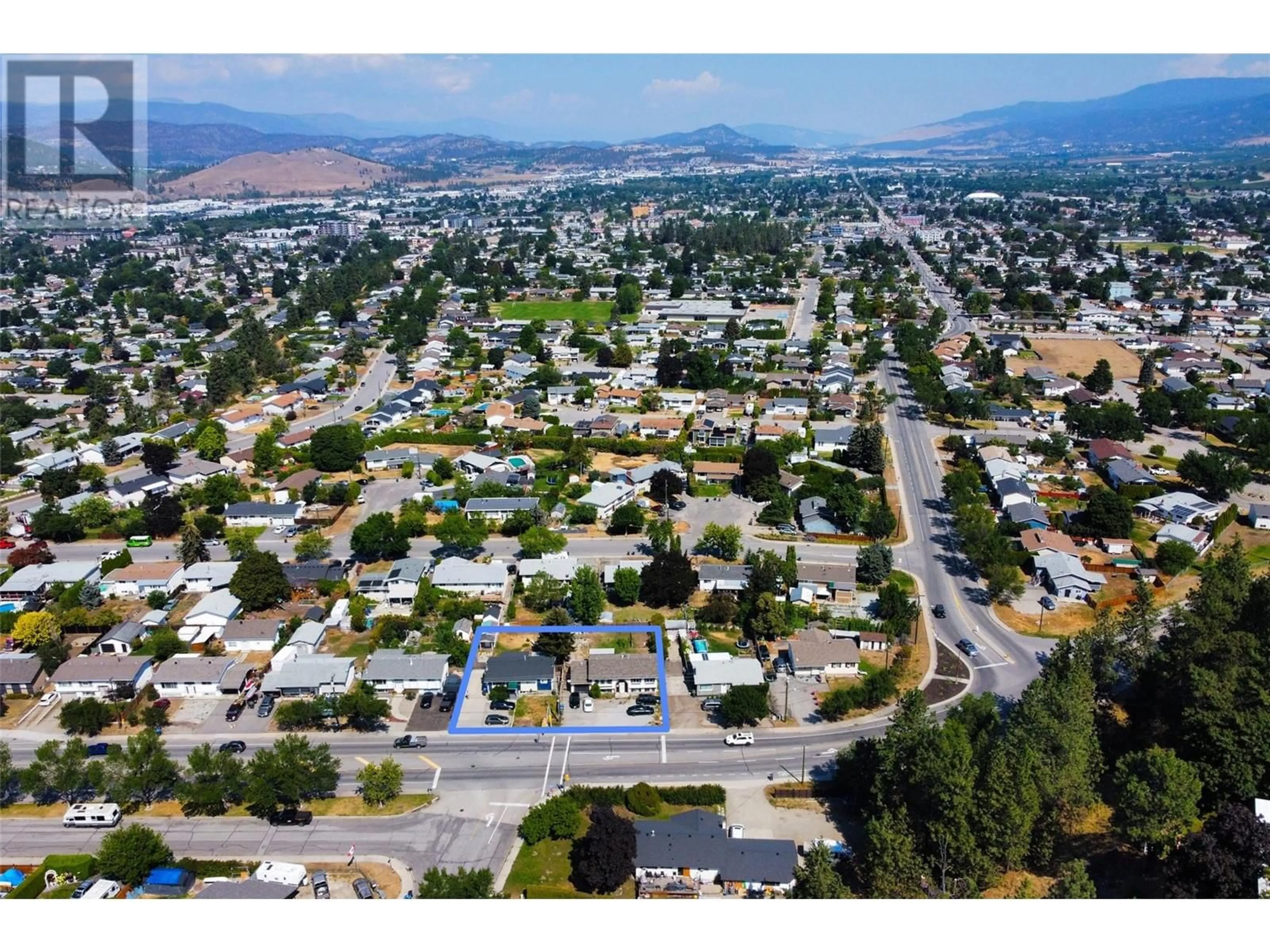 A pic from outside/outdoor area/front of a property/back of a property/a pic from drone, mountain view for 3072 Springfield Road, Kelowna British Columbia V1X4M4