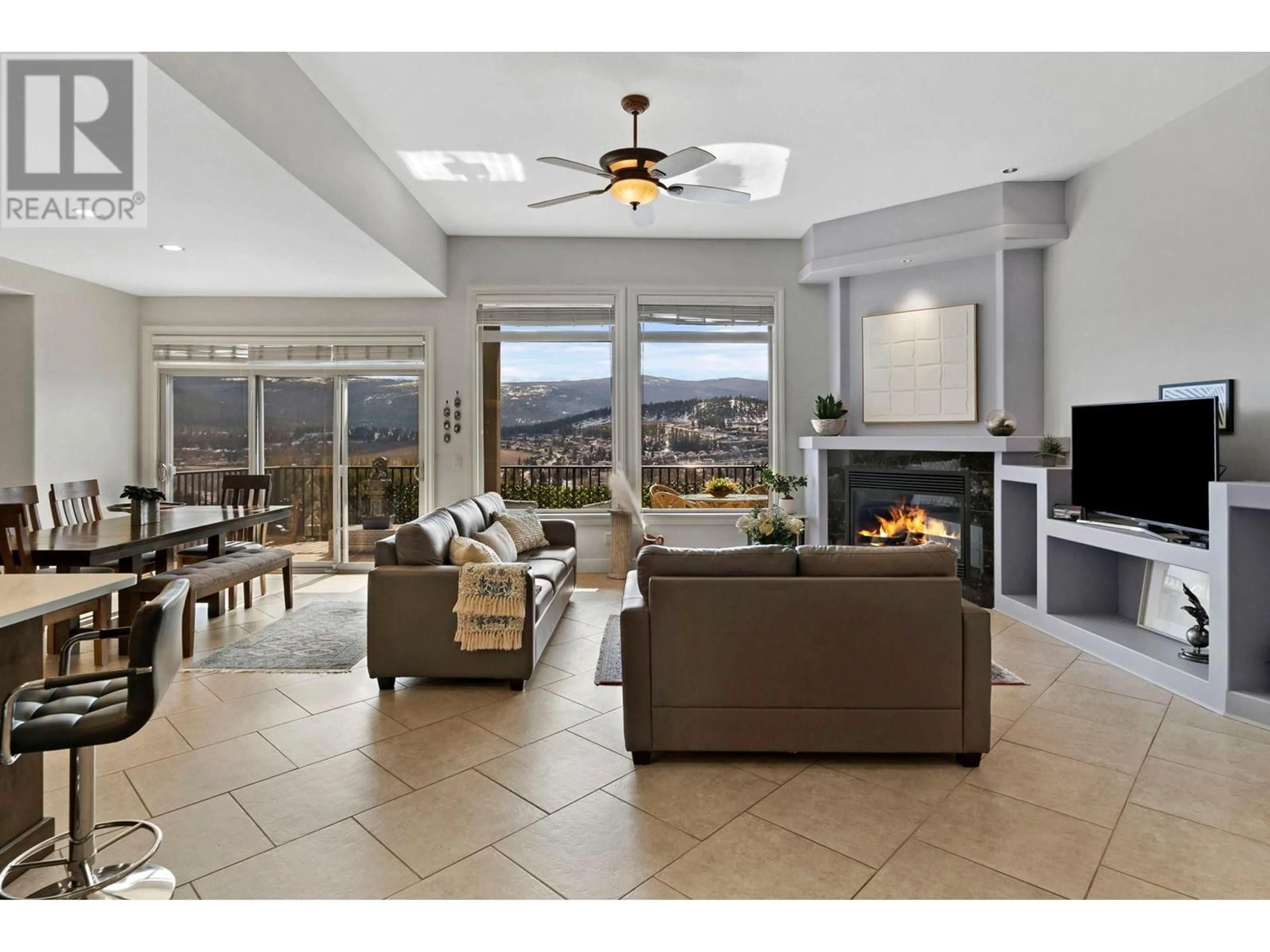 Living room with furniture, ceramic/tile floor for 1094 HENDERSON DRIVE, Kelowna British Columbia V1P1L8
