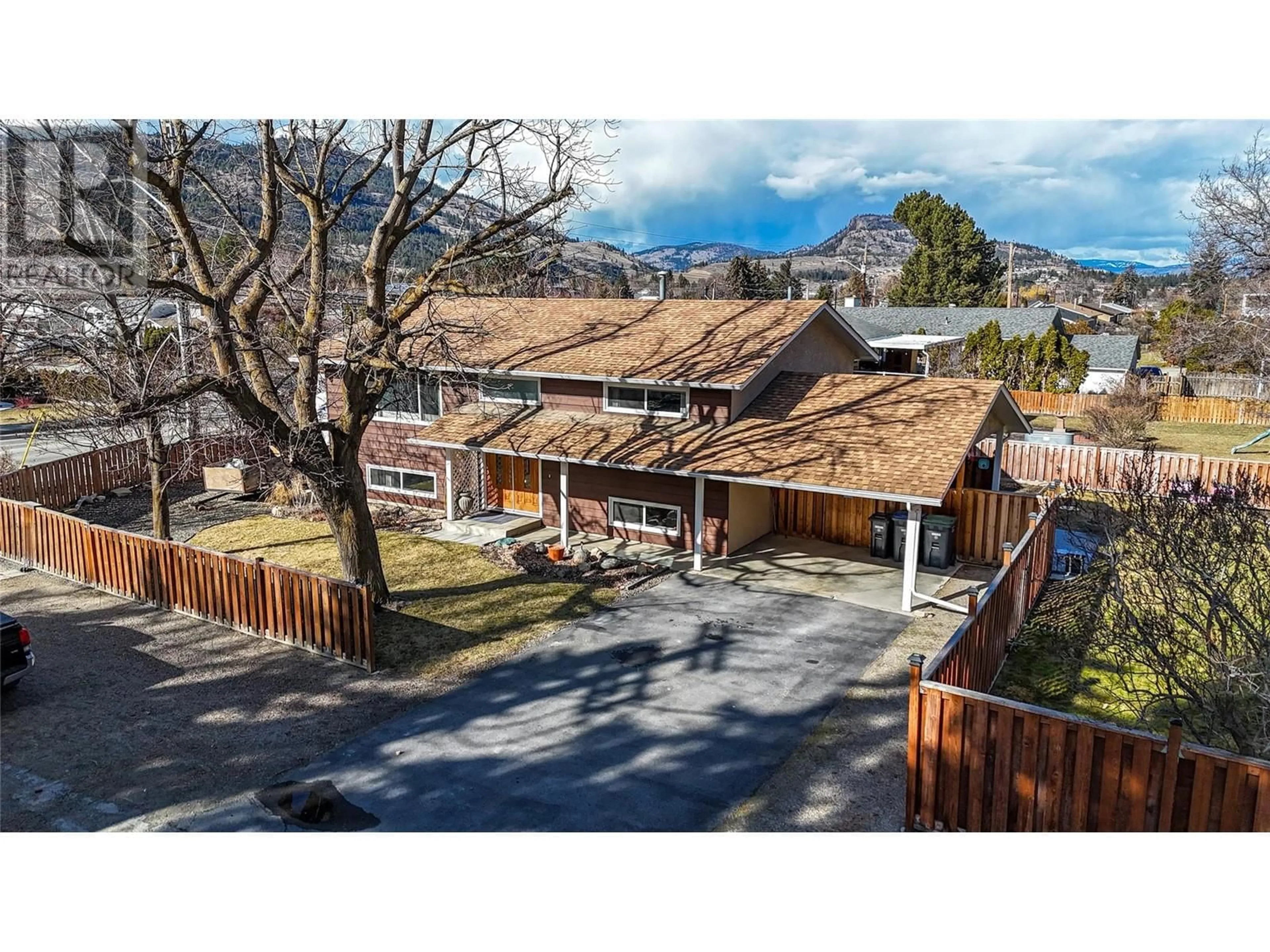 A pic from outside/outdoor area/front of a property/back of a property/a pic from drone, street for 9910 College Road, Summerland British Columbia V0H1Z2