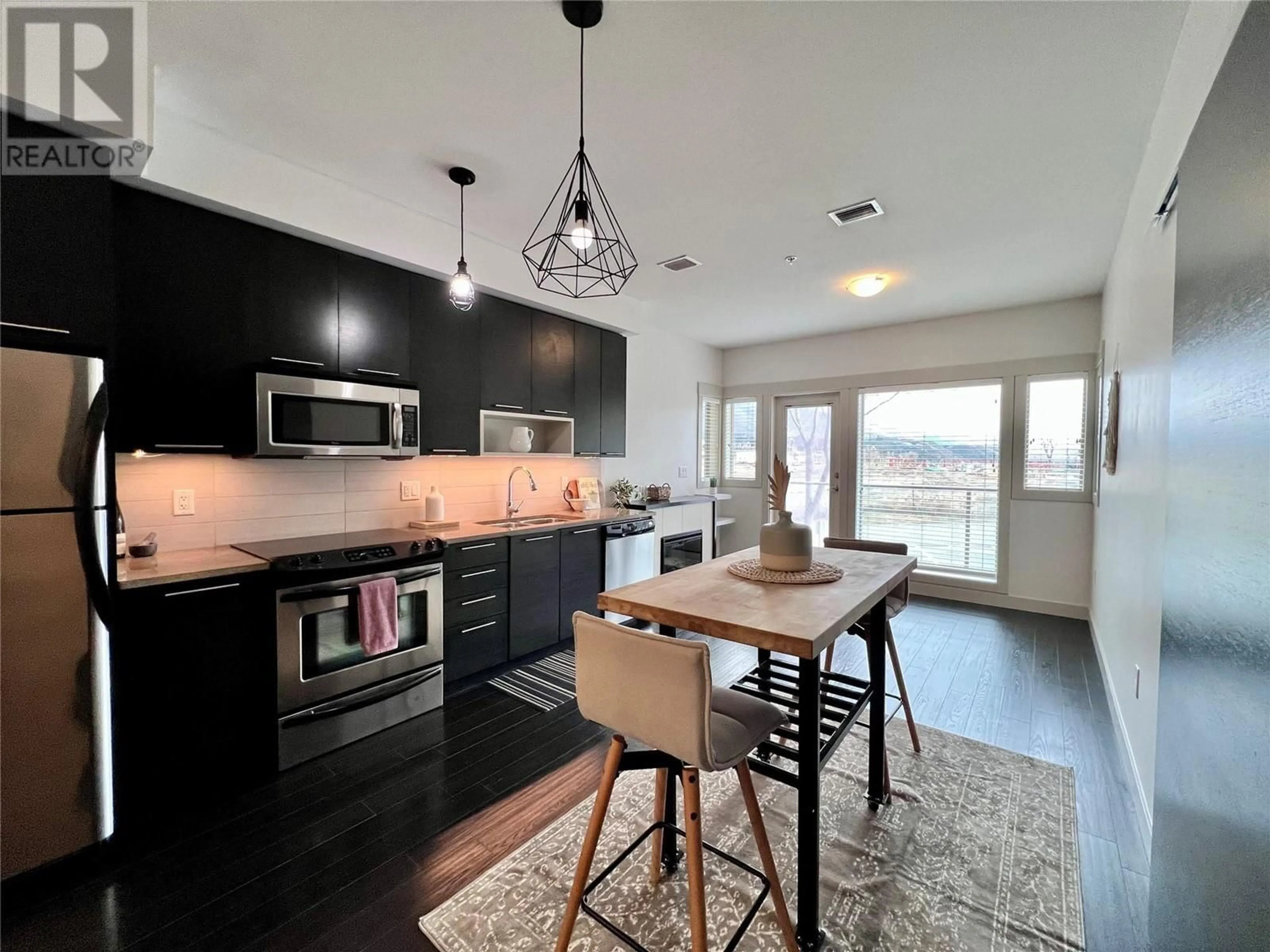 Open concept kitchen, unknown for 1210 - 1000 TALASA WAY, Kamloops British Columbia V2H1R1