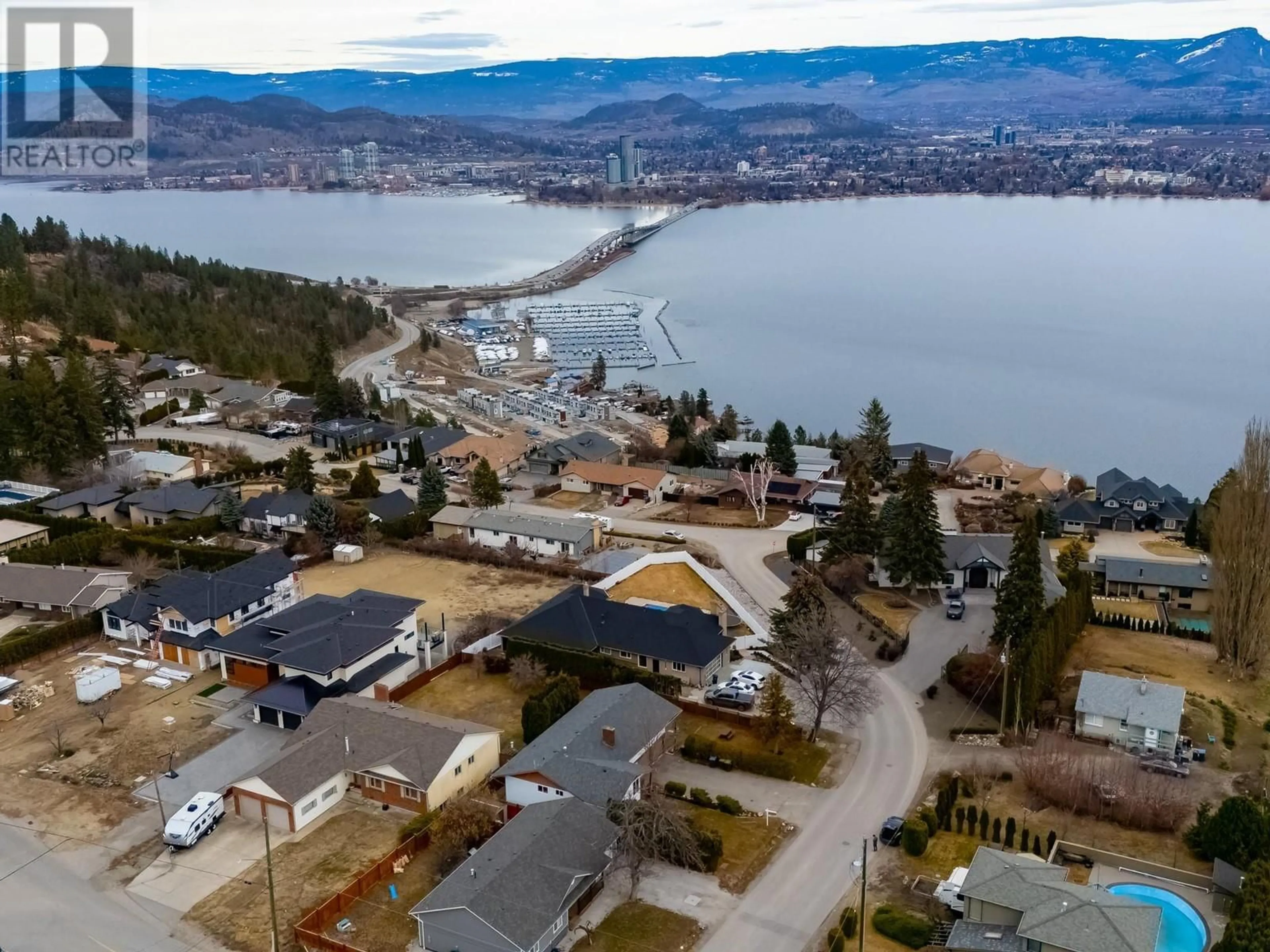 A pic from outside/outdoor area/front of a property/back of a property/a pic from drone, water/lake/river/ocean view for 580 Kelview Road, West Kelowna British Columbia V1Z1E3