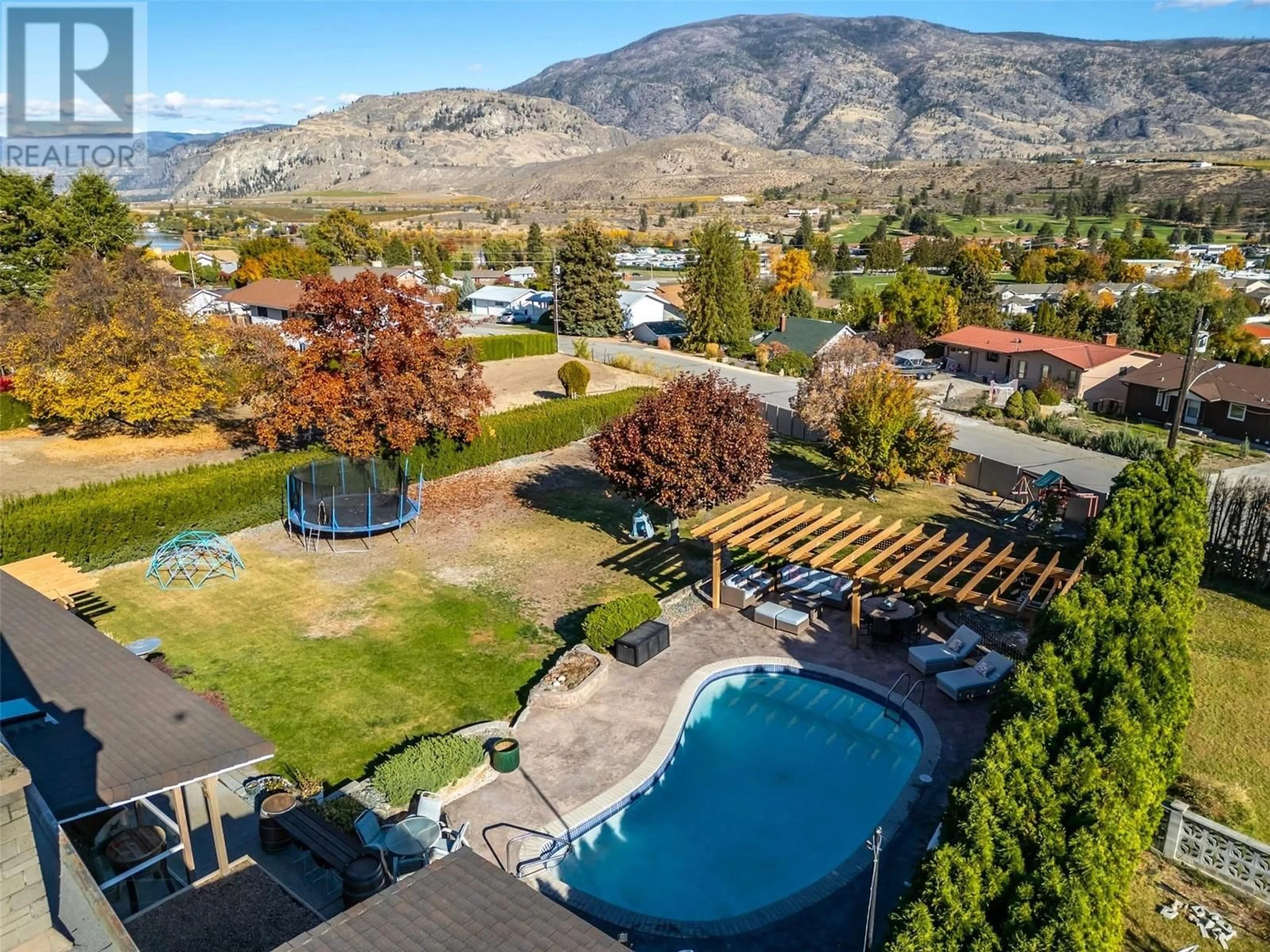 A pic from outside/outdoor area/front of a property/back of a property/a pic from drone, mountain view for 6521 BELLEVUE DRIVE, Oliver British Columbia V0H1T4