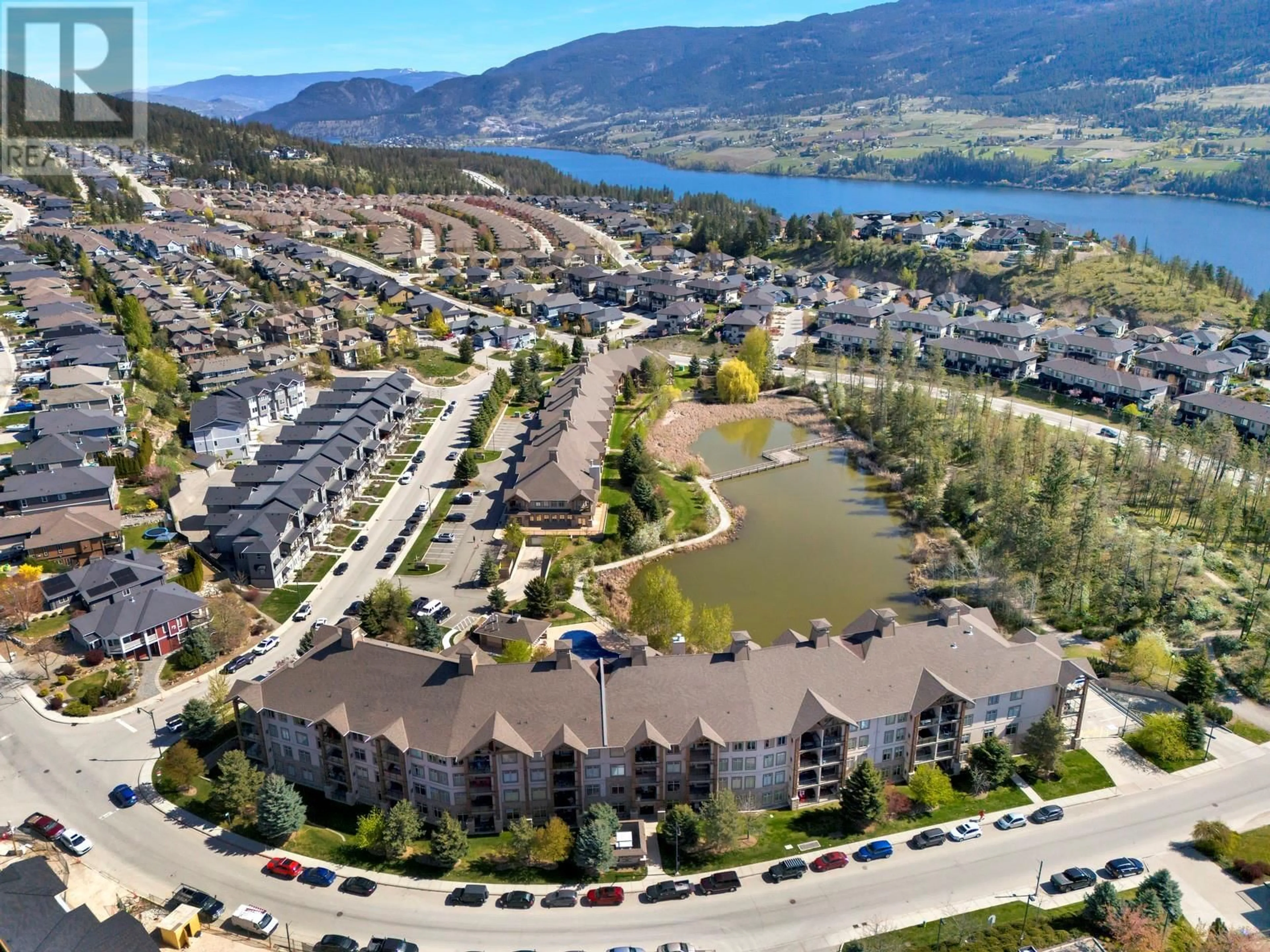 A pic from outside/outdoor area/front of a property/back of a property/a pic from drone, water/lake/river/ocean view for 113 - 2551 SHORELINE DRIVE, Lake Country British Columbia V4V2P2