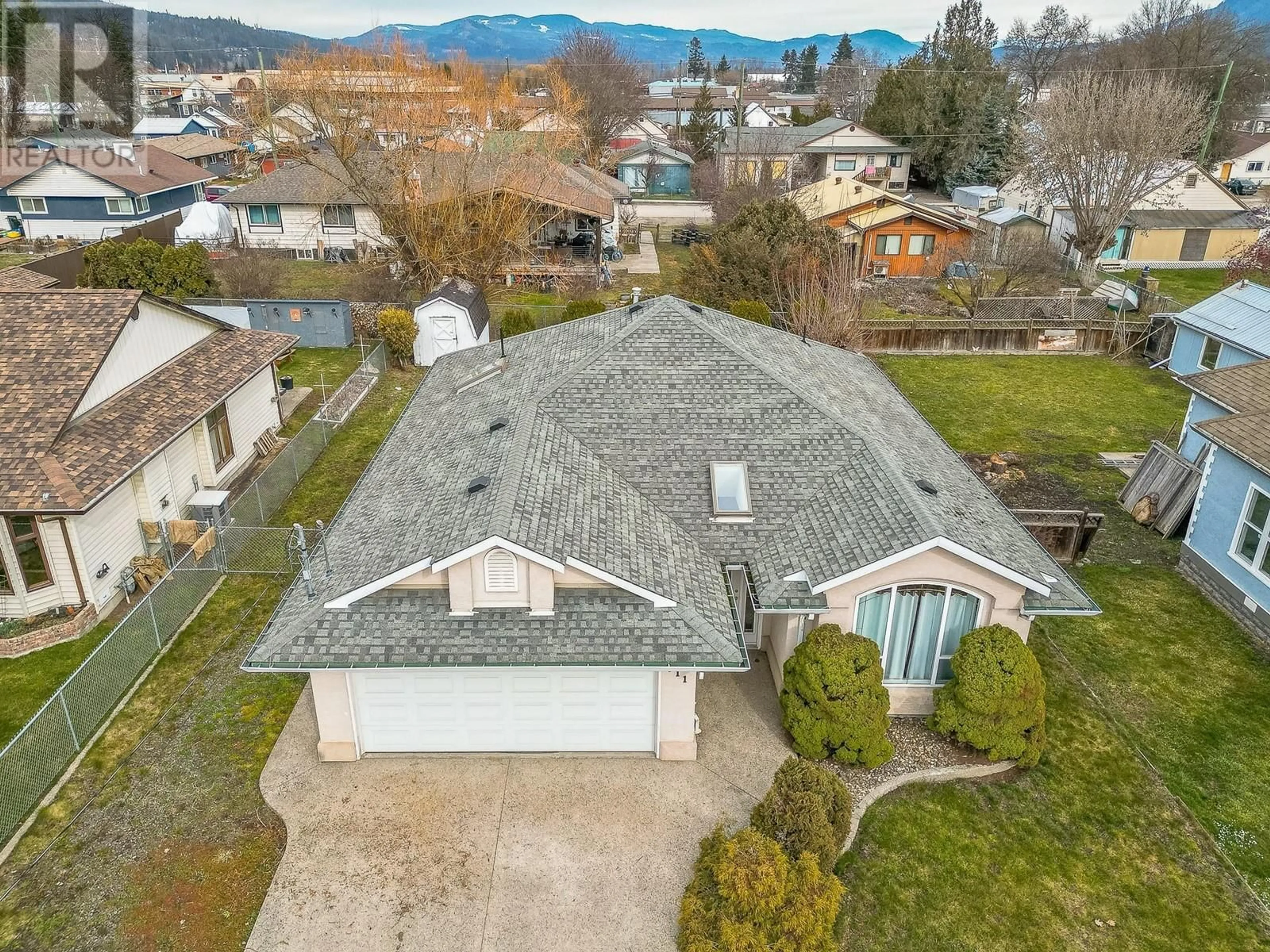 A pic from outside/outdoor area/front of a property/back of a property/a pic from drone, unknown for 711 Stanley Avenue, Enderby British Columbia V0E1V1