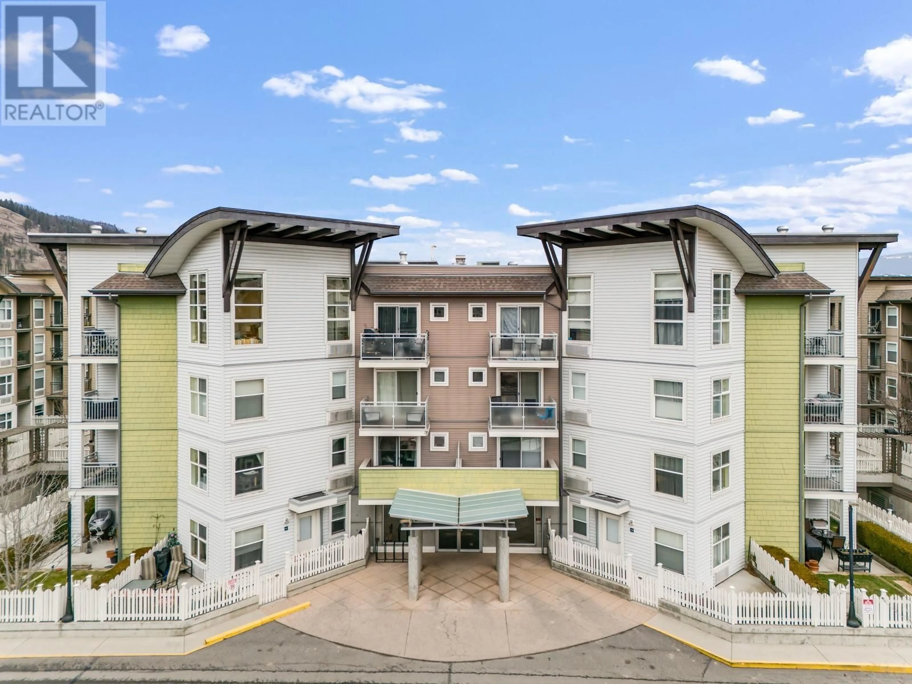 A pic from outside/outdoor area/front of a property/back of a property/a pic from drone, unknown for 539 Yates Road Unit# 202, Kelowna British Columbia V1V2T8