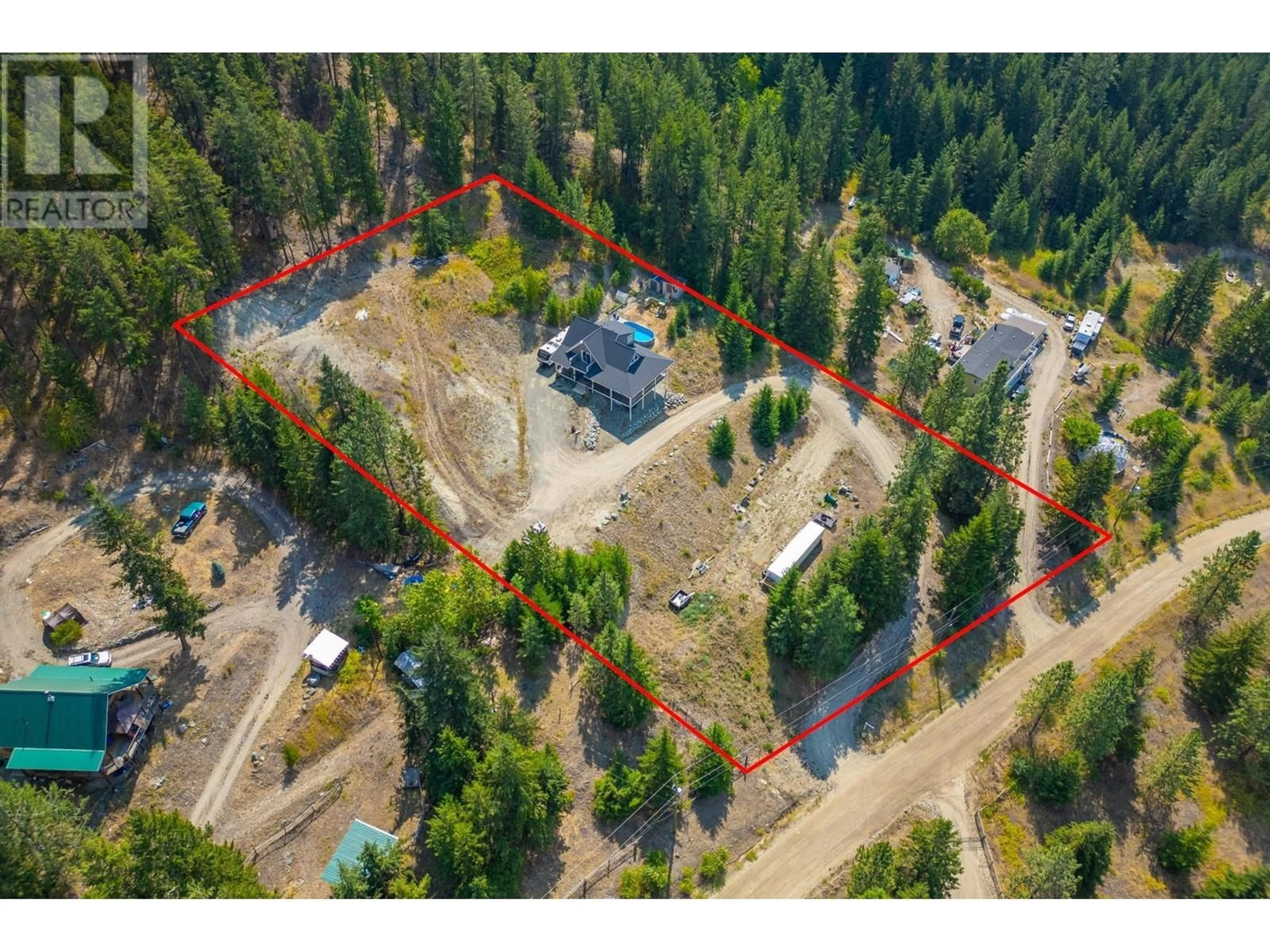 A pic from outside/outdoor area/front of a property/back of a property/a pic from drone, forest/trees view for 324 ORCHARD LAKE ROAD, Kamloops British Columbia V2H1T7