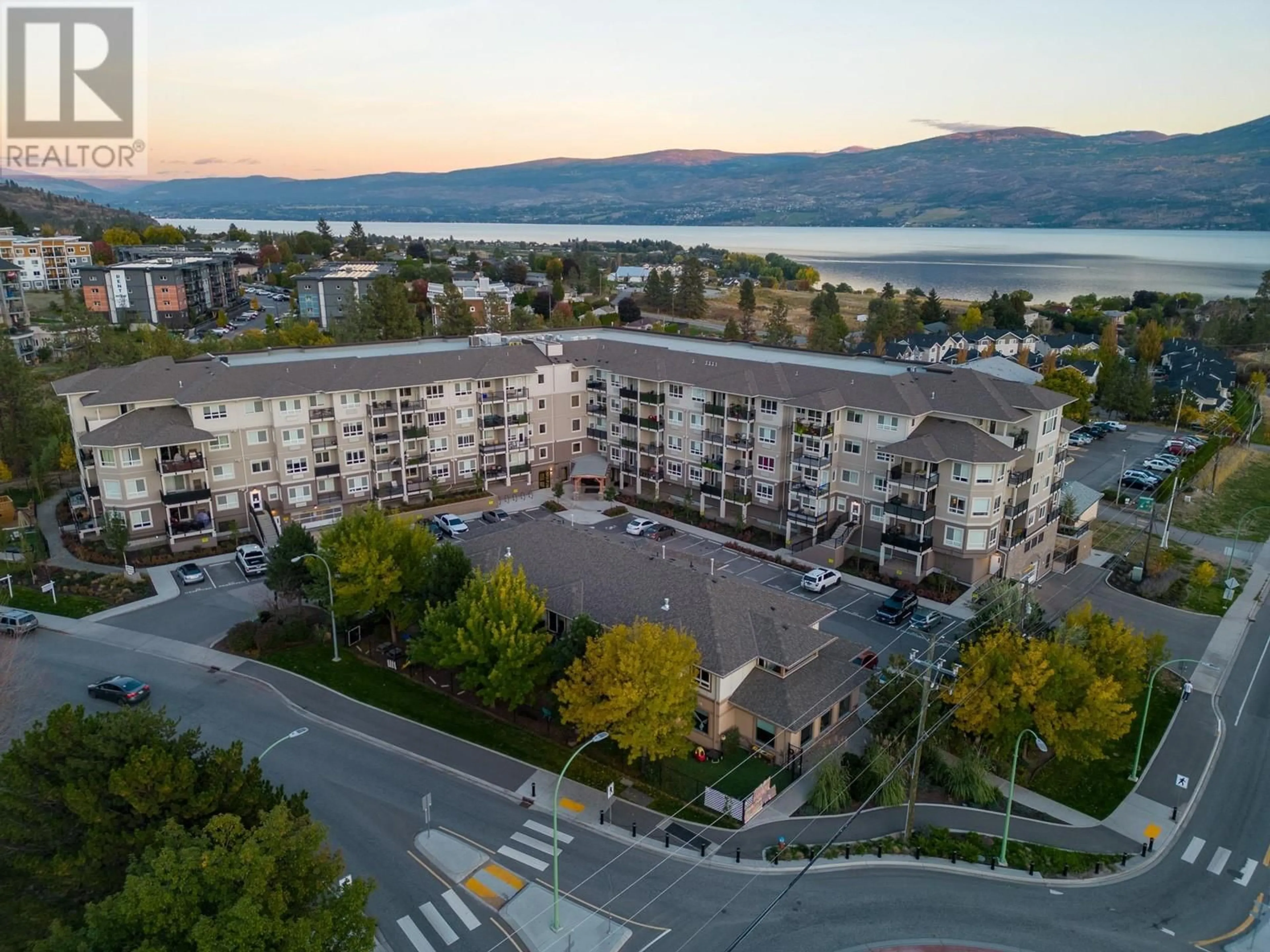 A pic from outside/outdoor area/front of a property/back of a property/a pic from drone, mountain view for 404 - 2301 CARRINGTON ROAD, West Kelowna British Columbia V4T3K8