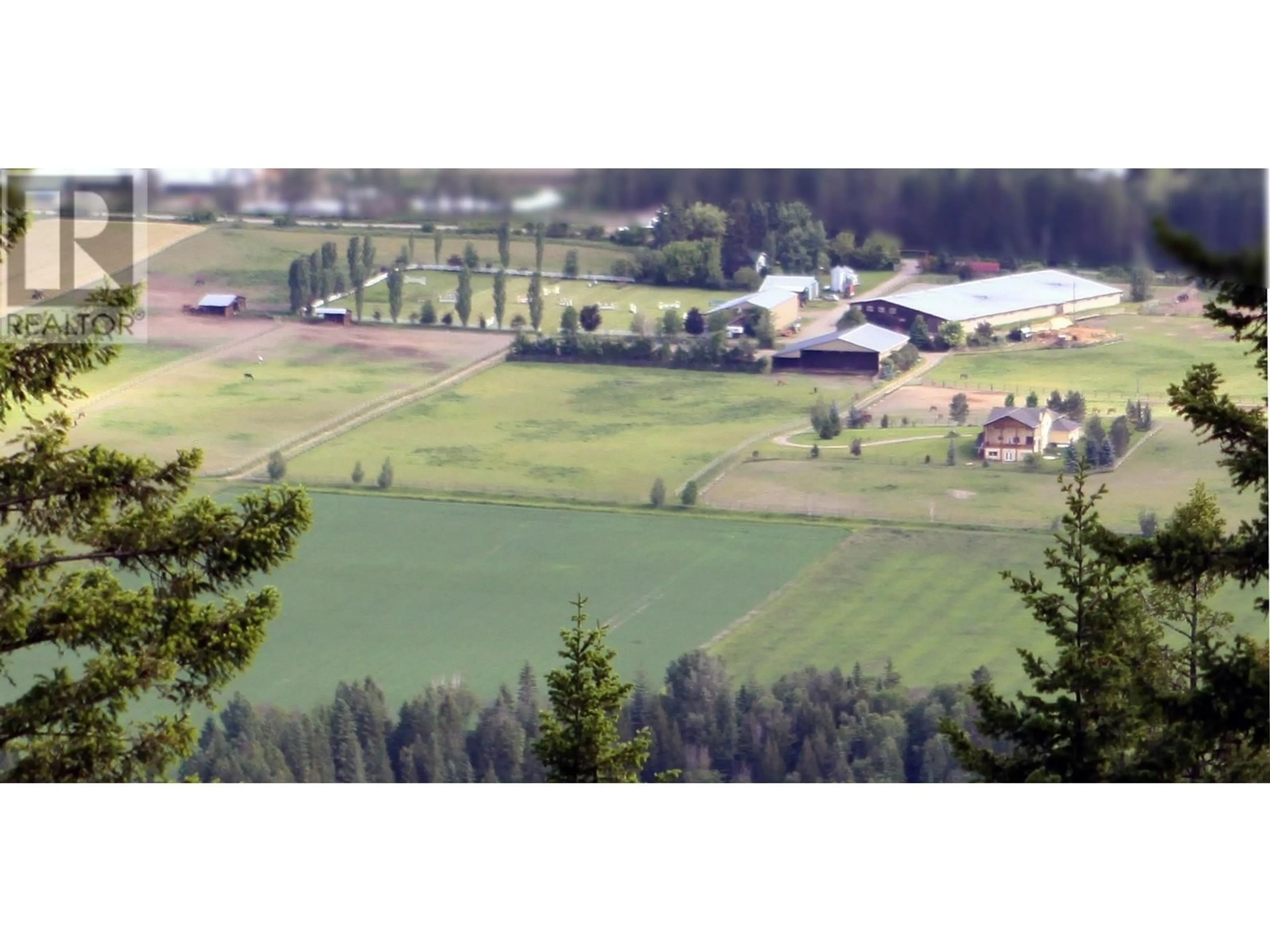 A pic from outside/outdoor area/front of a property/back of a property/a pic from drone, mountain view for 910 LUMBY MABEL LAKE ROAD, Lumby British Columbia V0E2G5